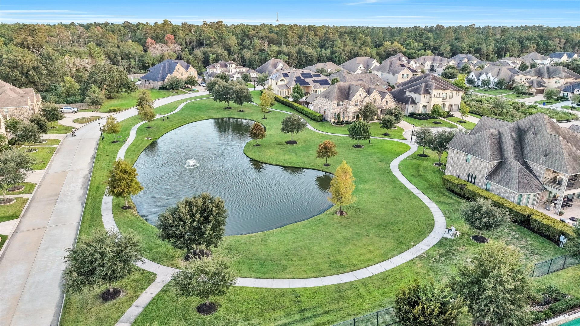 Just steps from the home is the neighborhood pond and paved walking trail. With no visible power lines and backing a forest, this peaceful community is a pleasure to come home to.
