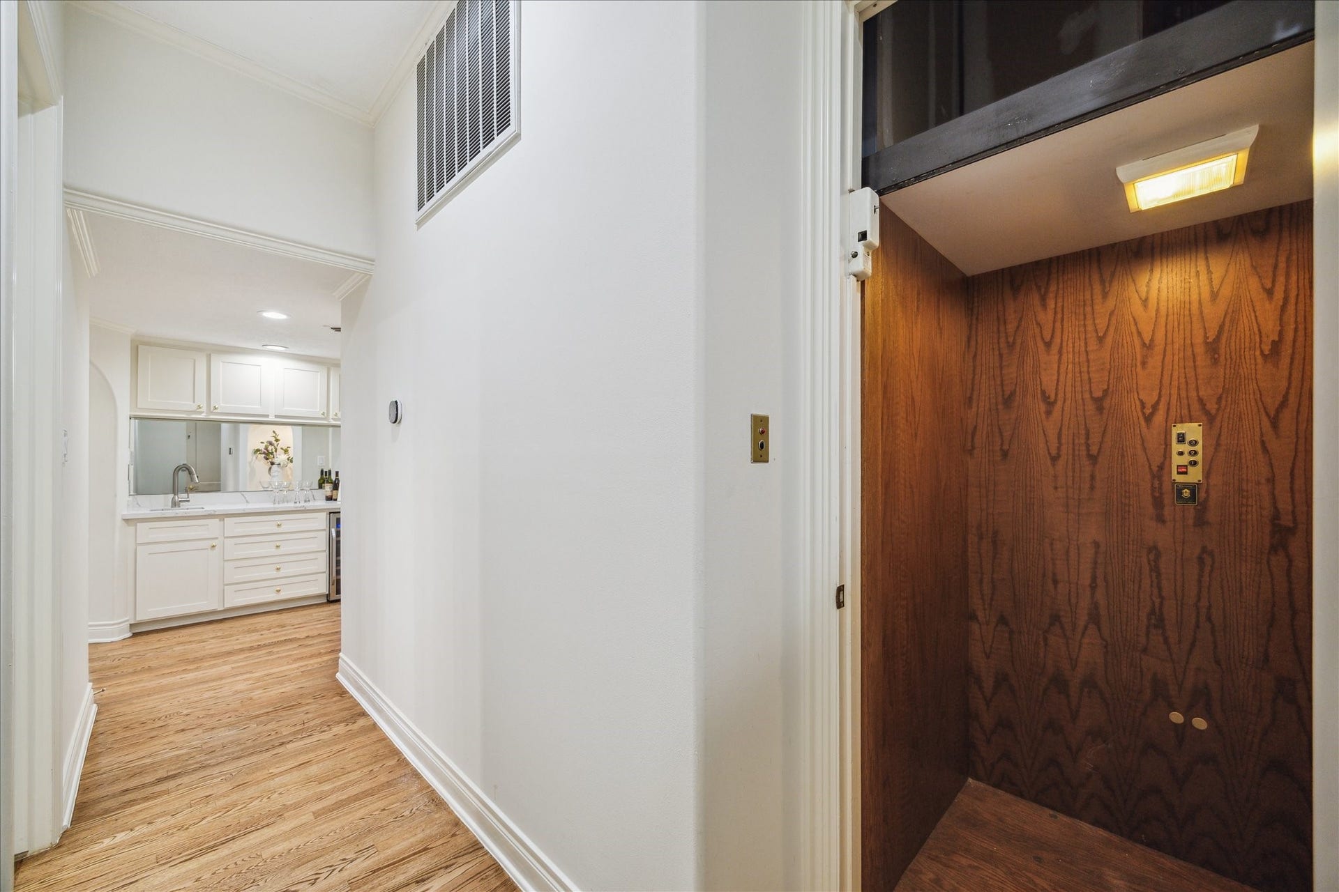38 Scotsmoor Court, Sugar Land, TX 77479 The elevator is situated in the hall to the formal powder and guest suite for easy access to all floors