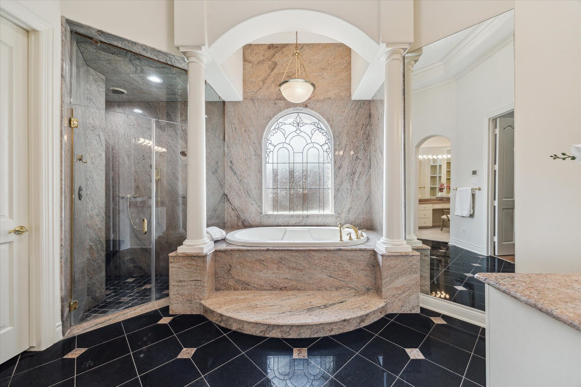 38 Scotsmoor Court, Sugar Land, TX 77479 Elegant bath and
boudoir with jetted tub and large glass walk in shower