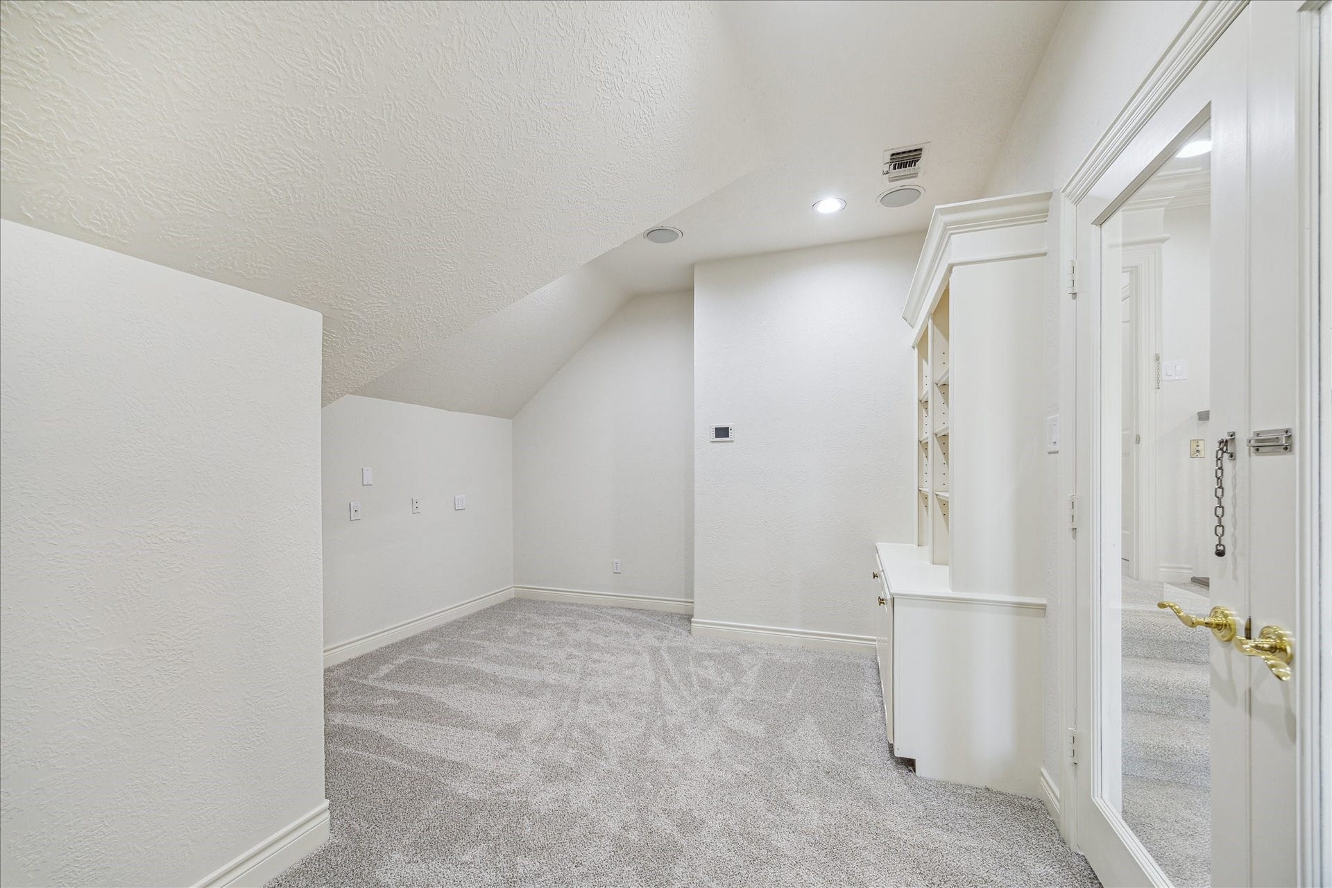 38 Scotsmoor Court, Sugar Land, TX 77479 This bonus room behind glass doors is located off the gameroom and has it's own built in bookcase and storage cabinet and a separate walk in closet