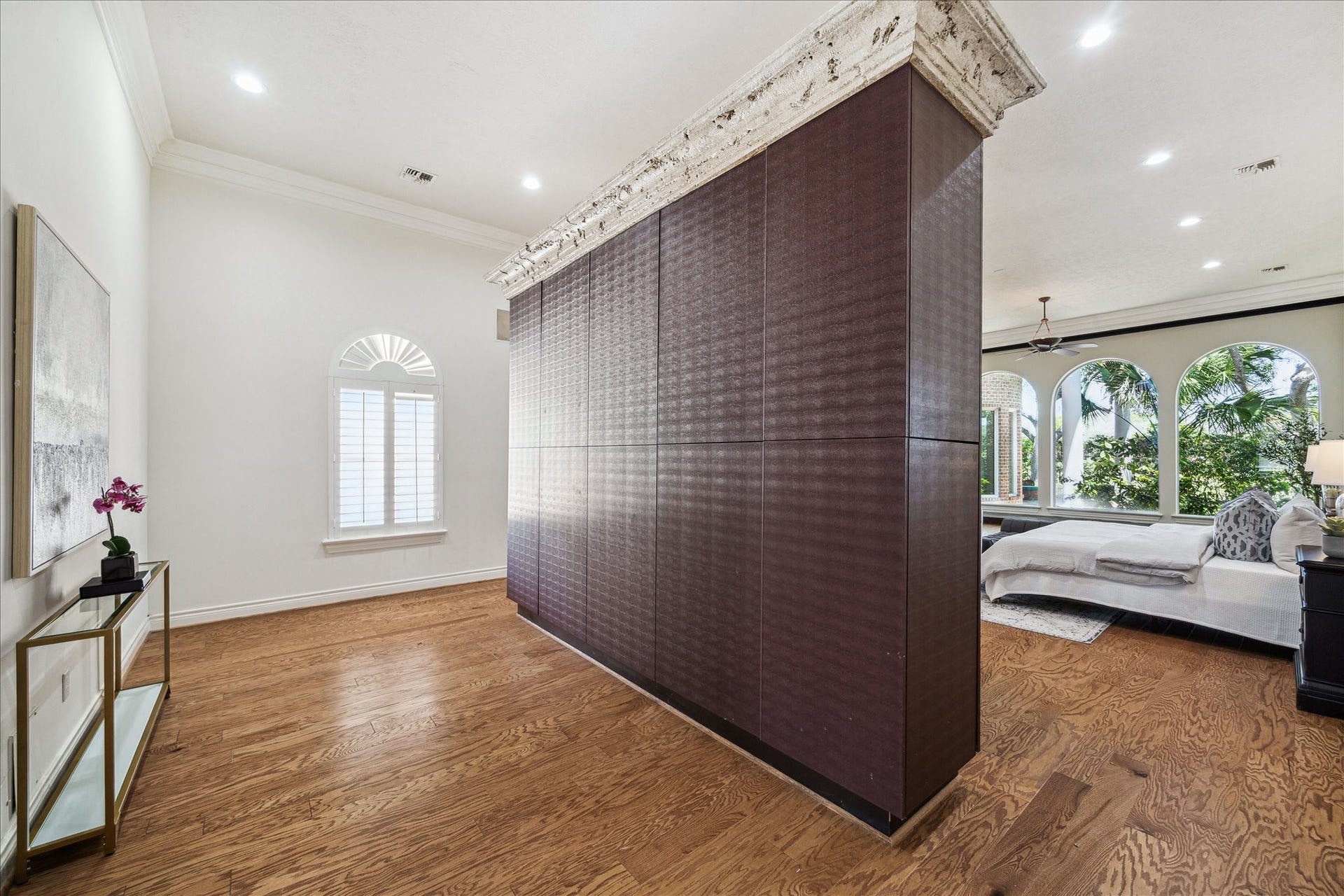 38 Scotsmoor Court, Sugar Land, TX 77479 The projector system in the primary suite creates a space behind for a sitting area or even office space for convenience