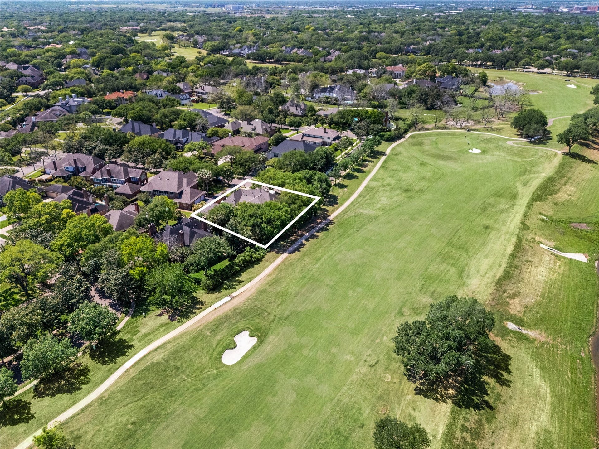 38 Scotsmoor Court, Sugar Land, TX 77479 An aierial view showing the location of the property on the golf course near hole 13.