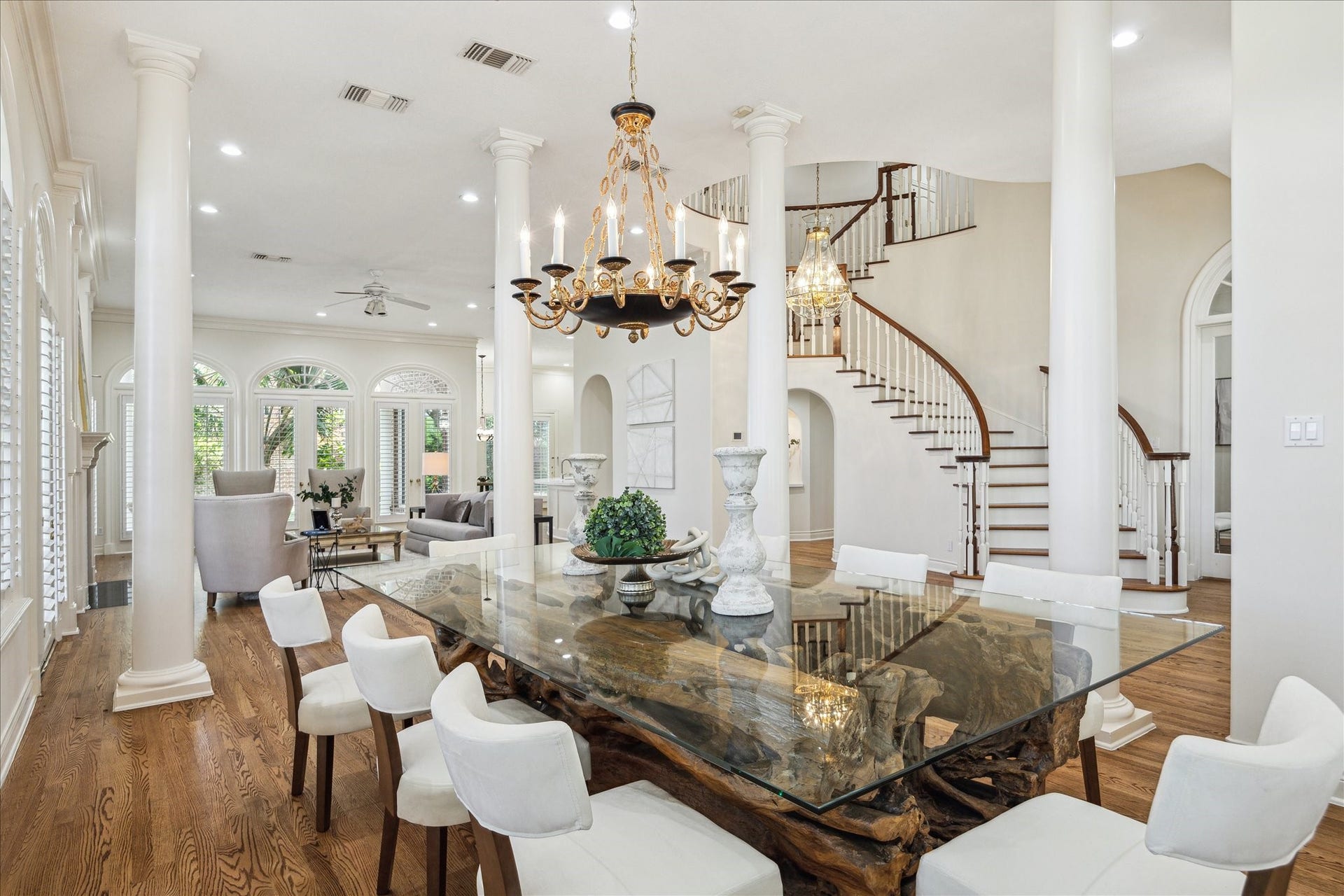 38 Scotsmoor Court, Sugar Land, TX 77479 The beautiful open concept living and dining space has 14' ceilings and accent columns