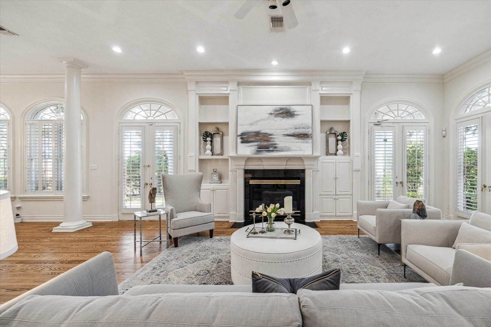 38 Scotsmoor Court, Sugar Land, TX 77479 Focal point gas fireplace and accent shelving