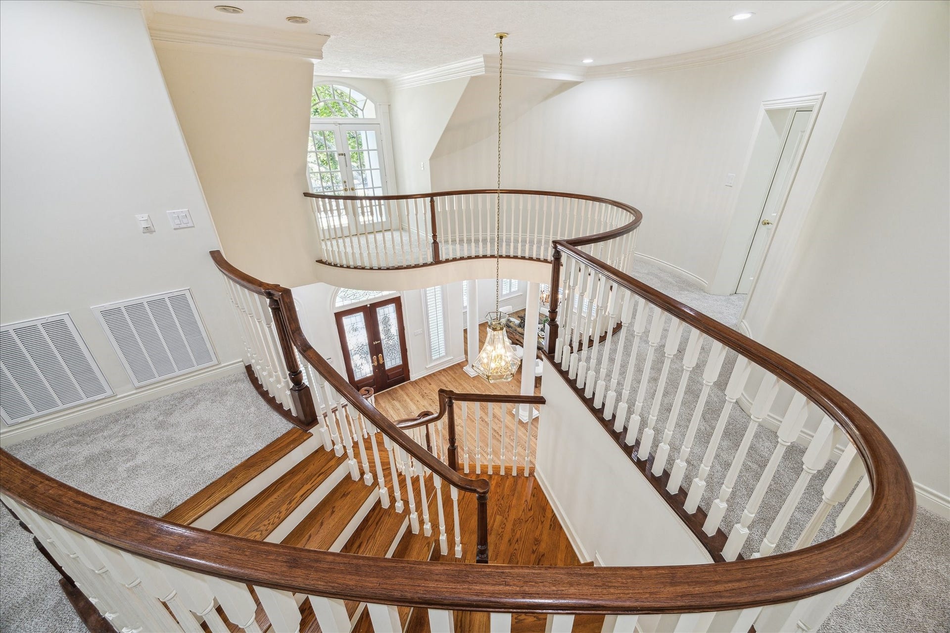 38 Scotsmoor Court, Sugar Land, TX 77479 This view showcases the elegant second story balcony looking down to the entry