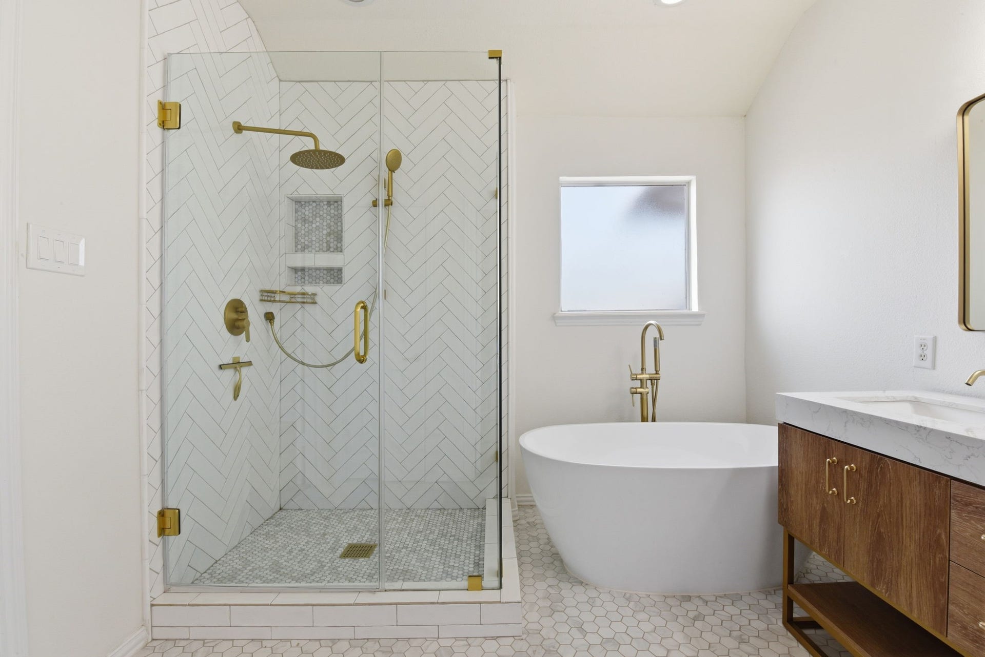 16023 Powder Springs Lane, Houston, TX 77070 Another look at this completely remodeled primary bath with gold hardware and fixtures.