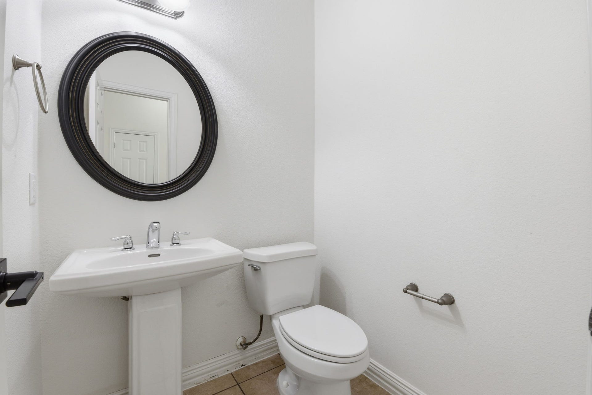 16023 Powder Springs Lane, Houston, TX 77070 Half bath downstairs with fresh paint!