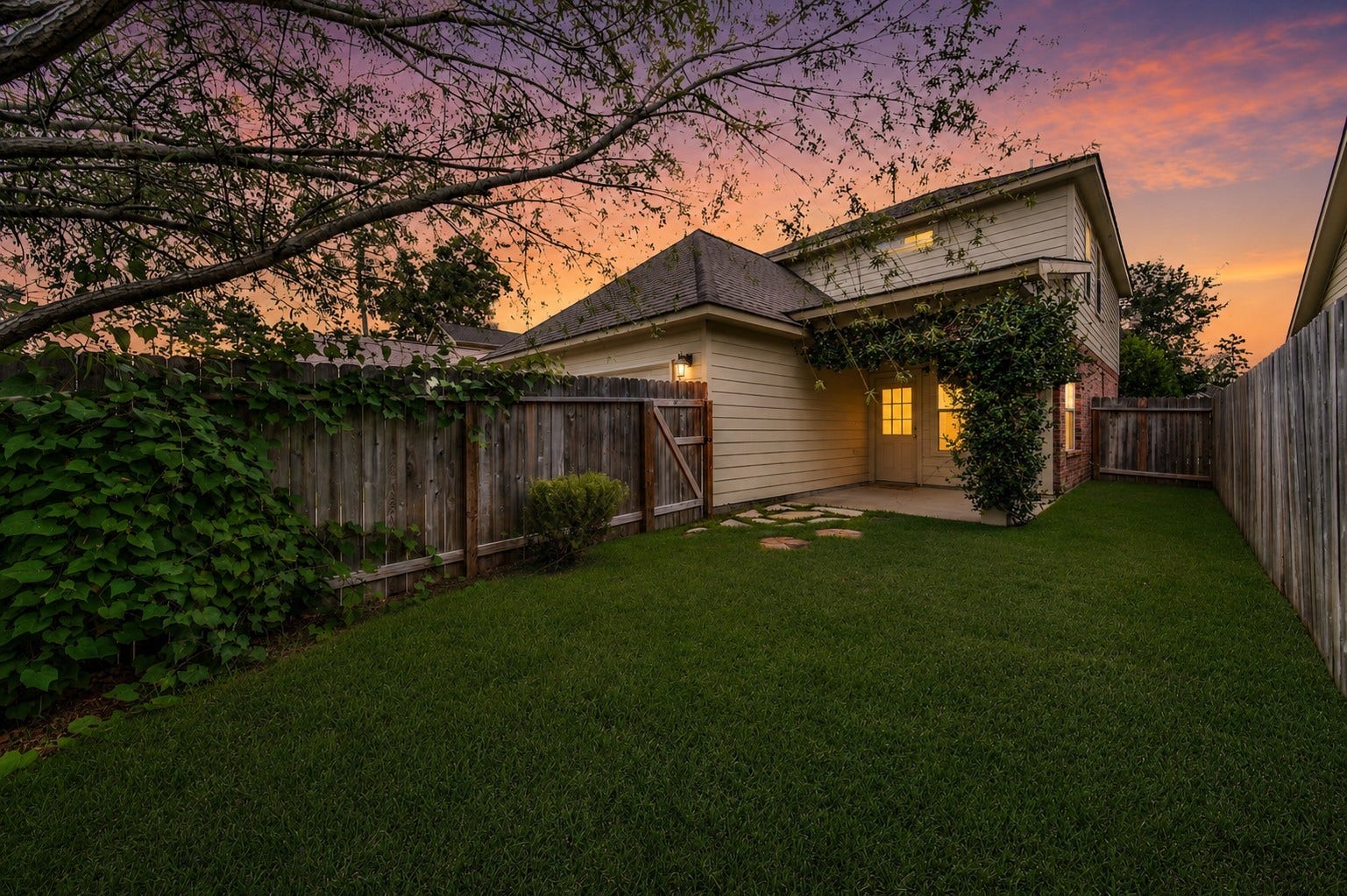 Peaceful backyard. Image is digitally altered to simulate twilight.