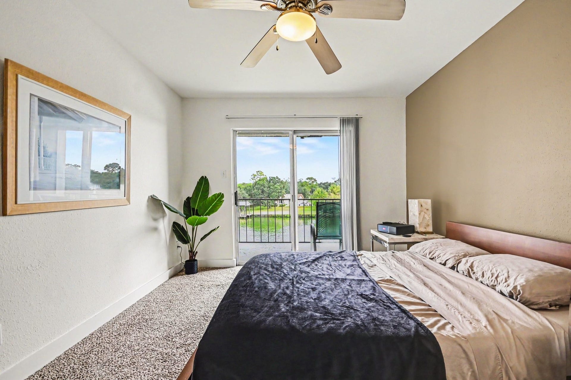 18511 Egret Bay Boulevard, #102, Webster, TX 77058 Primary bedroom with water view from the balcony
