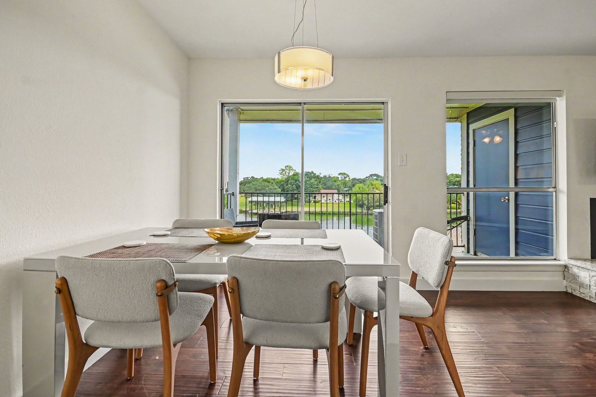 18511 Egret Bay Boulevard, #102, Webster, TX 77058 Dining area with natural light and balcony access