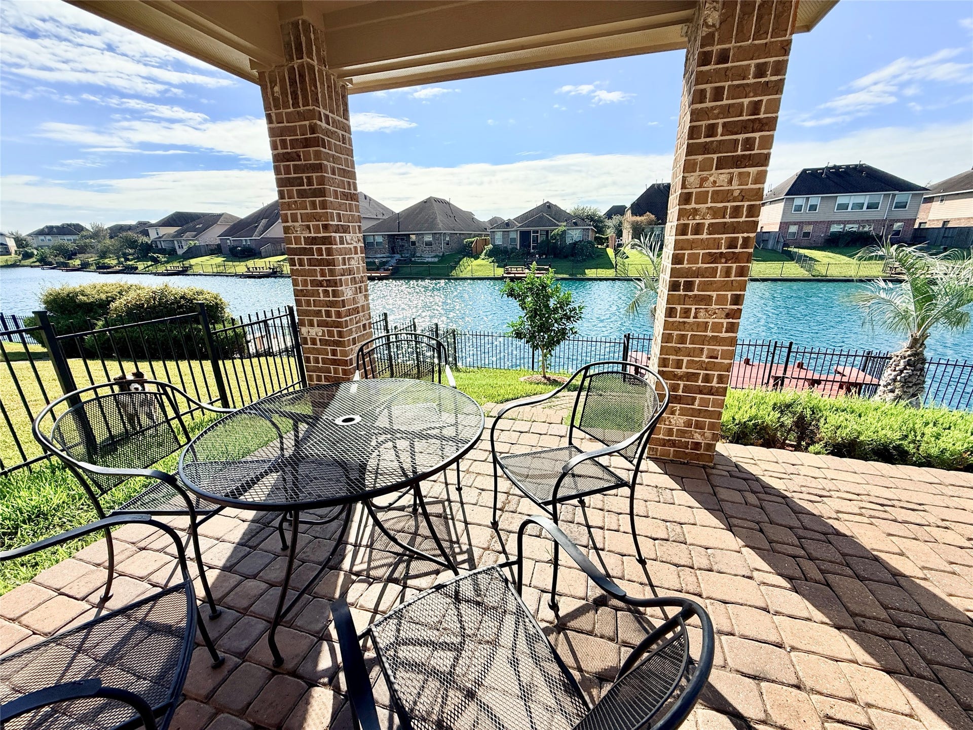 3951 Amalfi Shores Court, Missouri City, TX 77459 covered patio w/private pier on the lake w/fishing & pedal boating