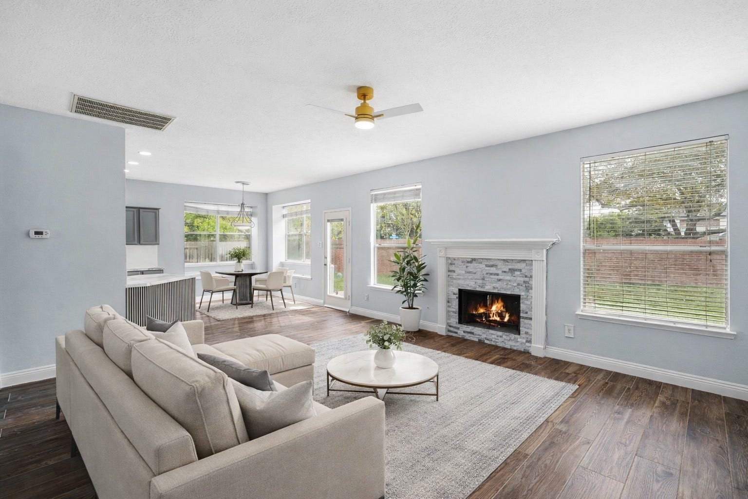 2623 Pine Shadows Drive, Sugar Land, TX 77479 Fall in love with this bright, open living space featuring large windows that pour in natural light and beautiful brand new flooring that ties it all together