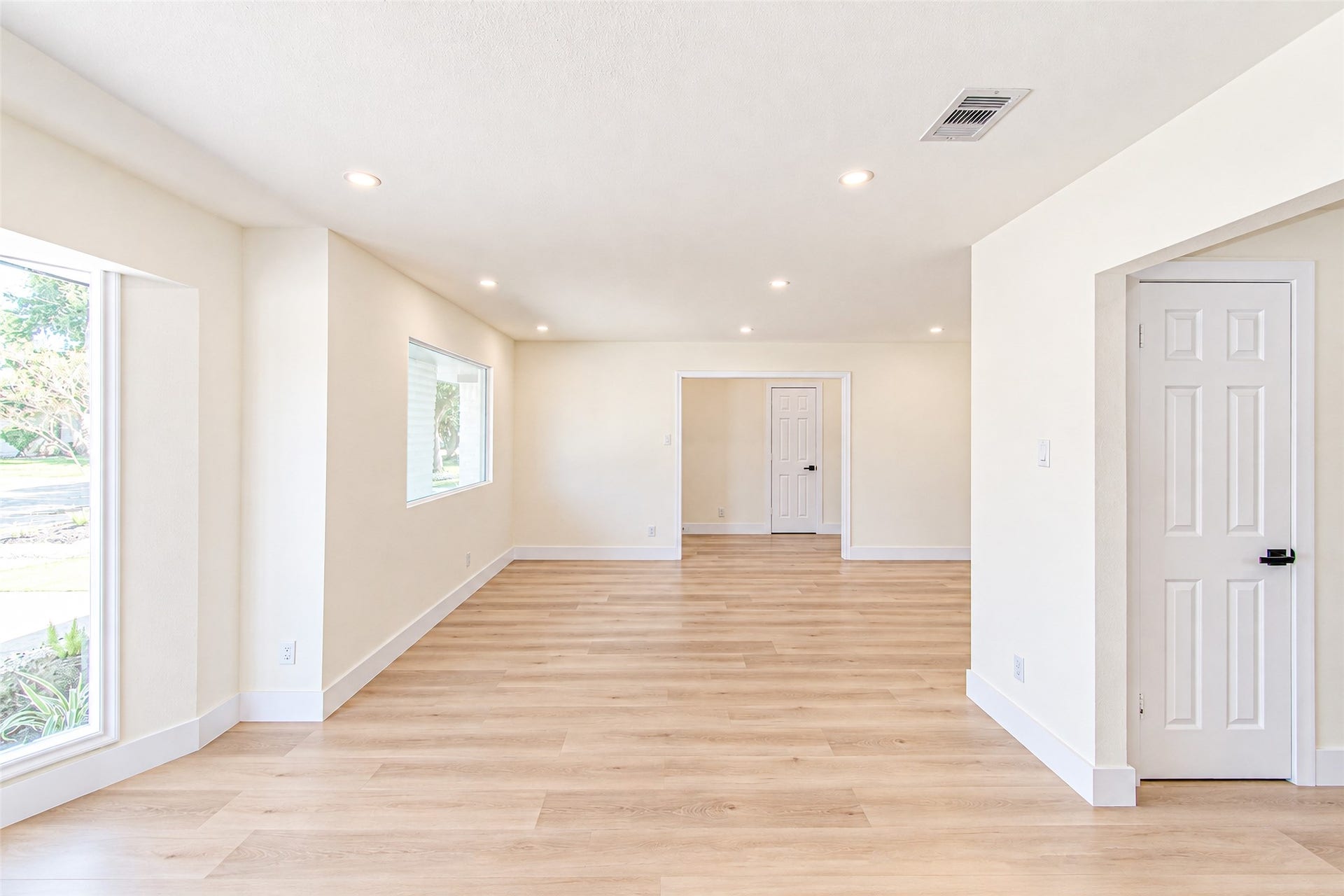 7623 Braes Meadow Drive, Houston, TX 77071 Bright and inviting, this spacious dining room boasts luxury vinyl flooring and floods with natural light, perfect for hosting memorable gatherings.