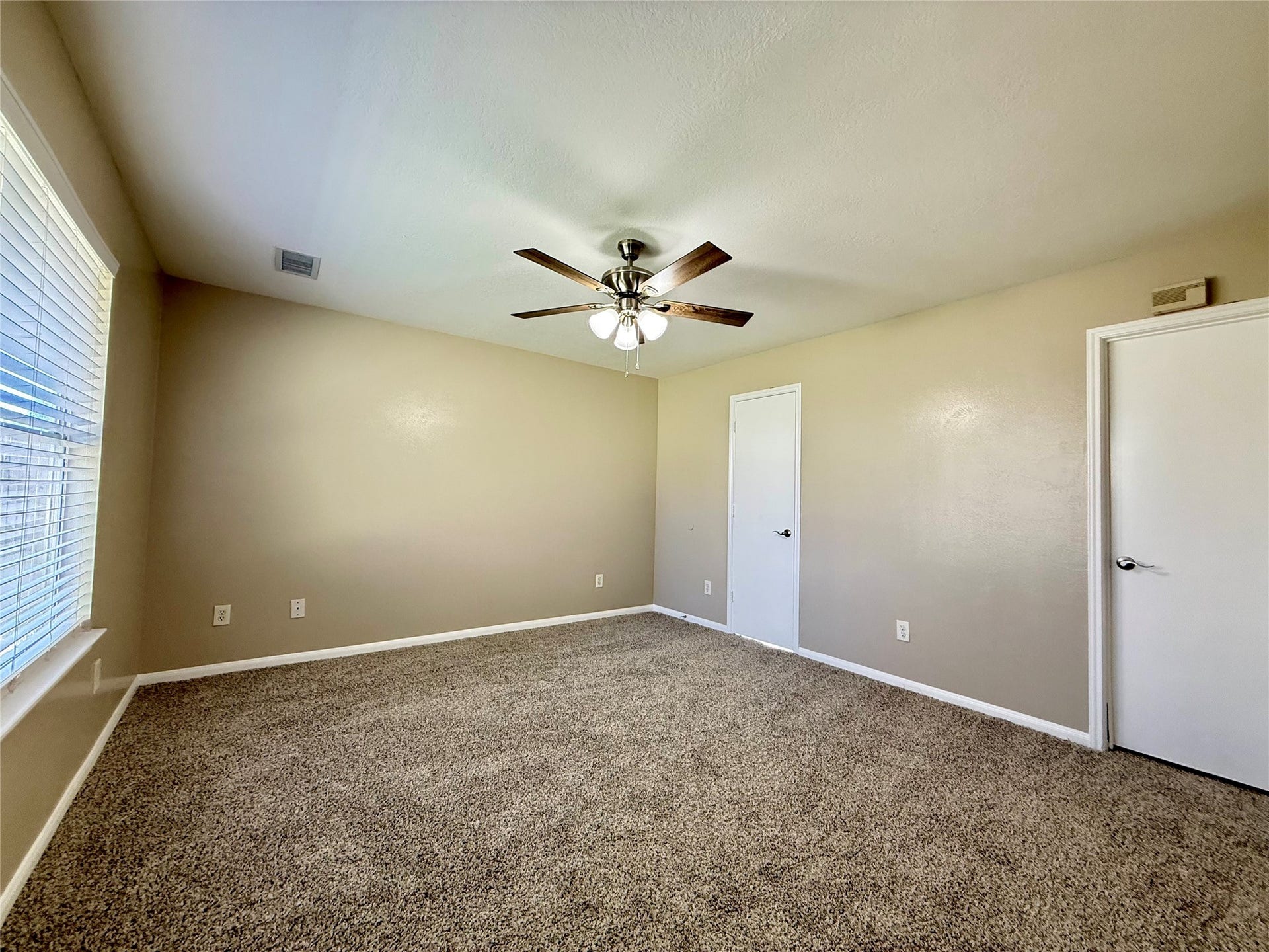 21514 Broadstone Drive, Katy, TX 77449 View of the primary bedroom with new carpet.