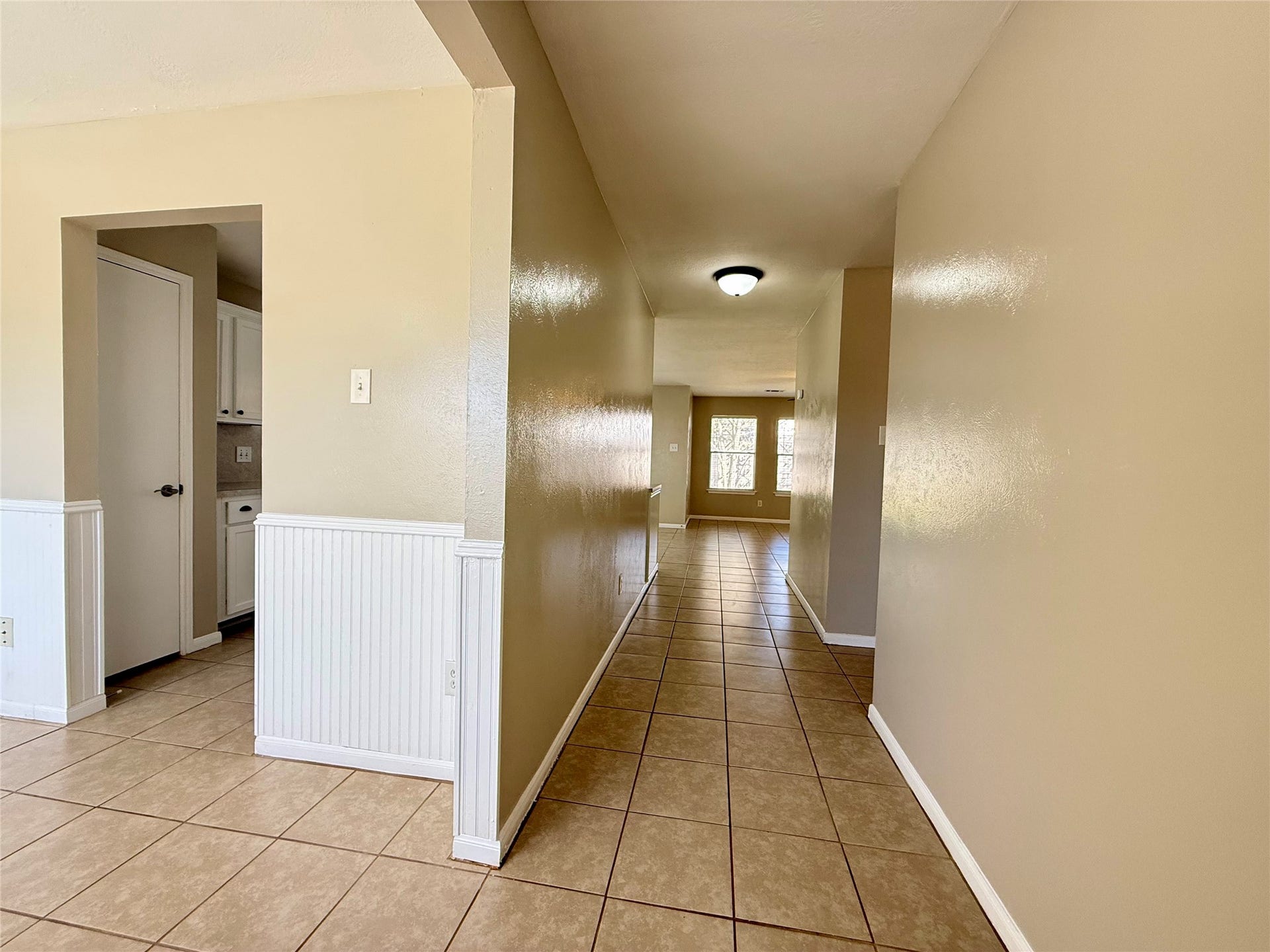 21514 Broadstone Drive, Katy, TX 77449 As you enter the front door, you will see tile floors throughout the living areas and a formal dining area to the left.