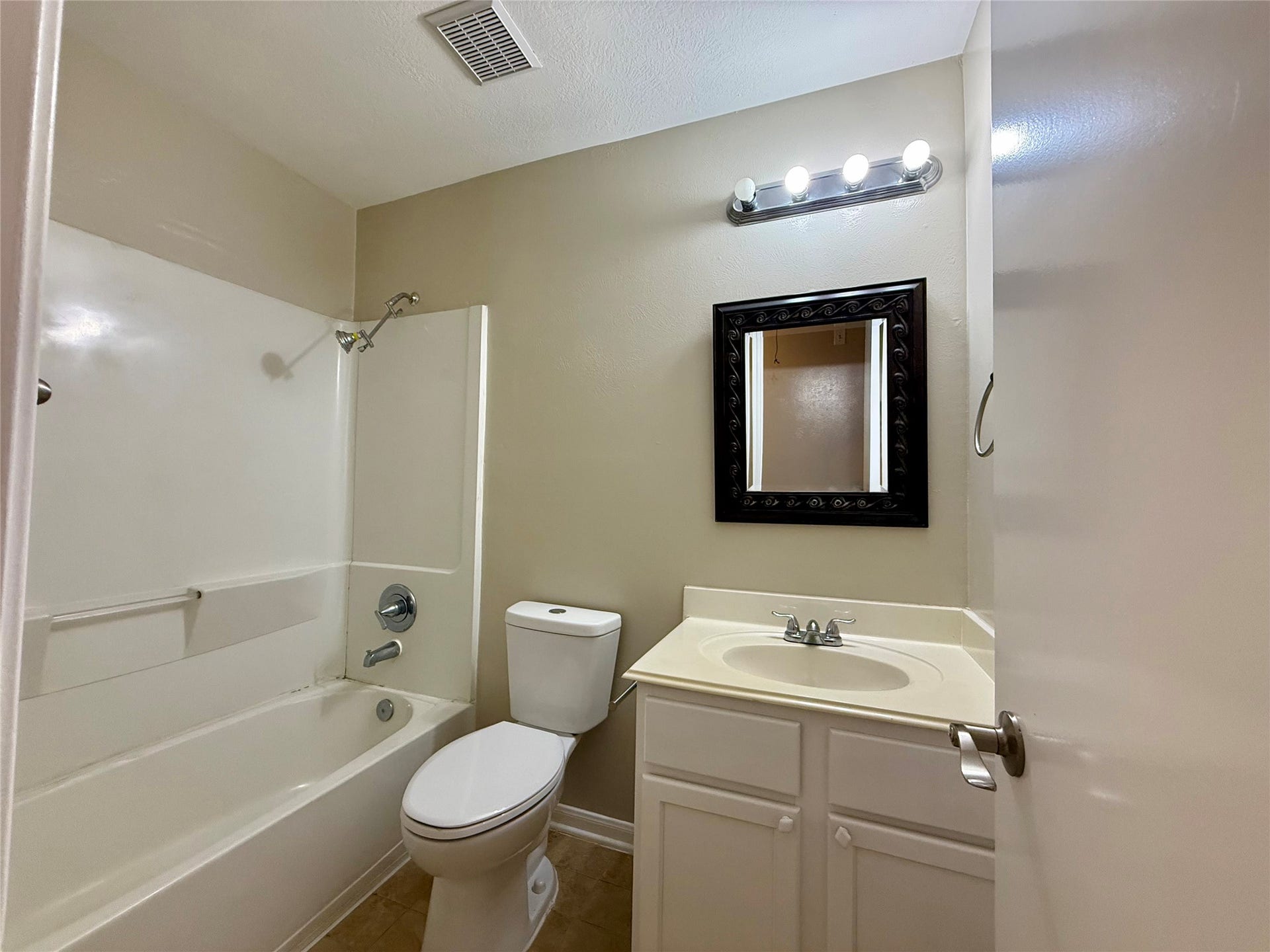 21514 Broadstone Drive, Katy, TX 77449 The hall bathroom between the two bedrooms in the front of the house.