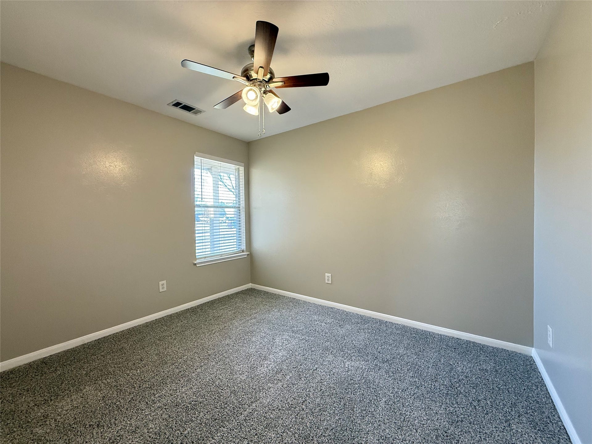 21514 Broadstone Drive, Katy, TX 77449 One of the secondary bedrooms with new carpet.