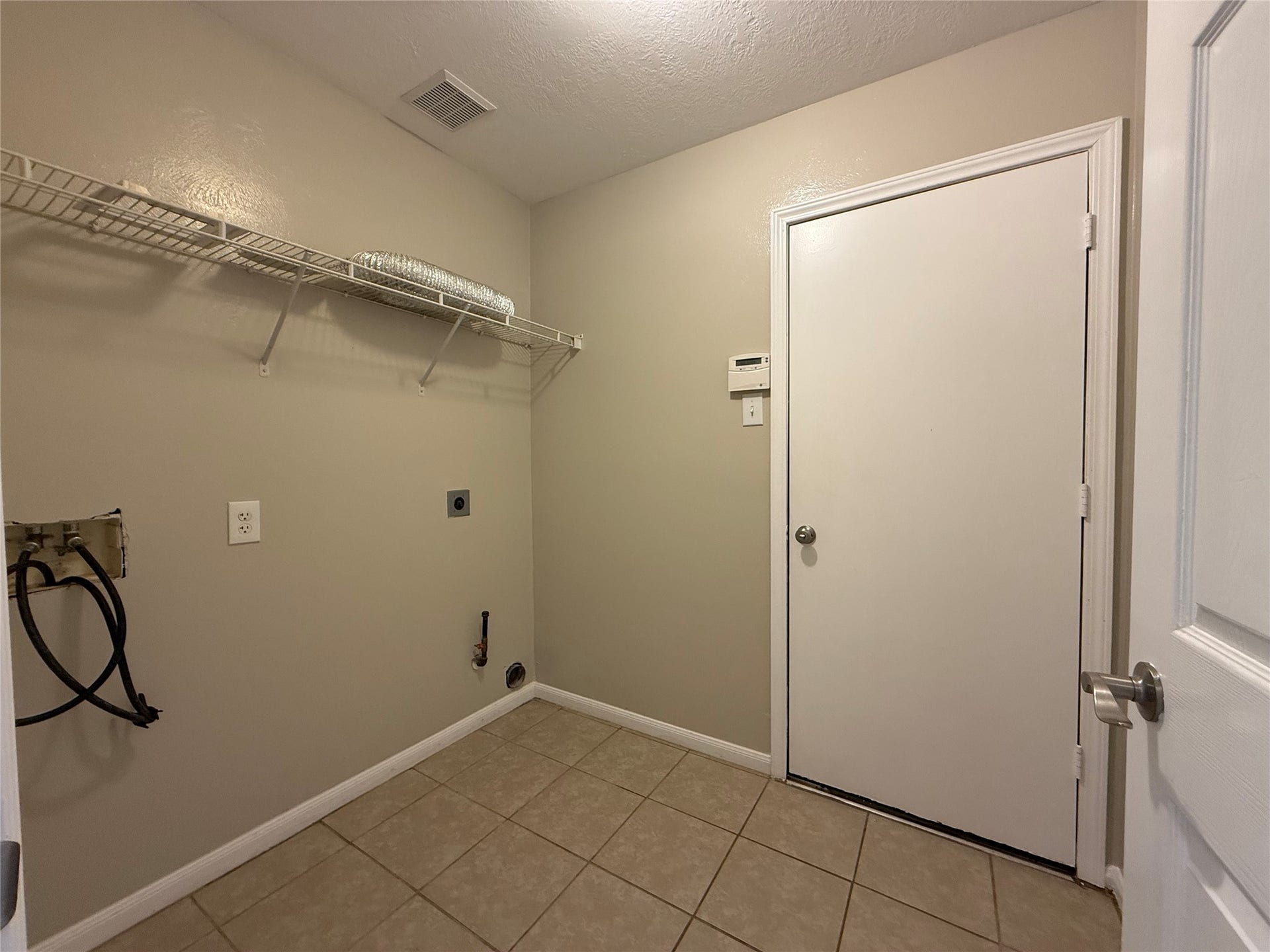 21514 Broadstone Drive, Katy, TX 77449 The laundry room includes connections for a gas dryer.