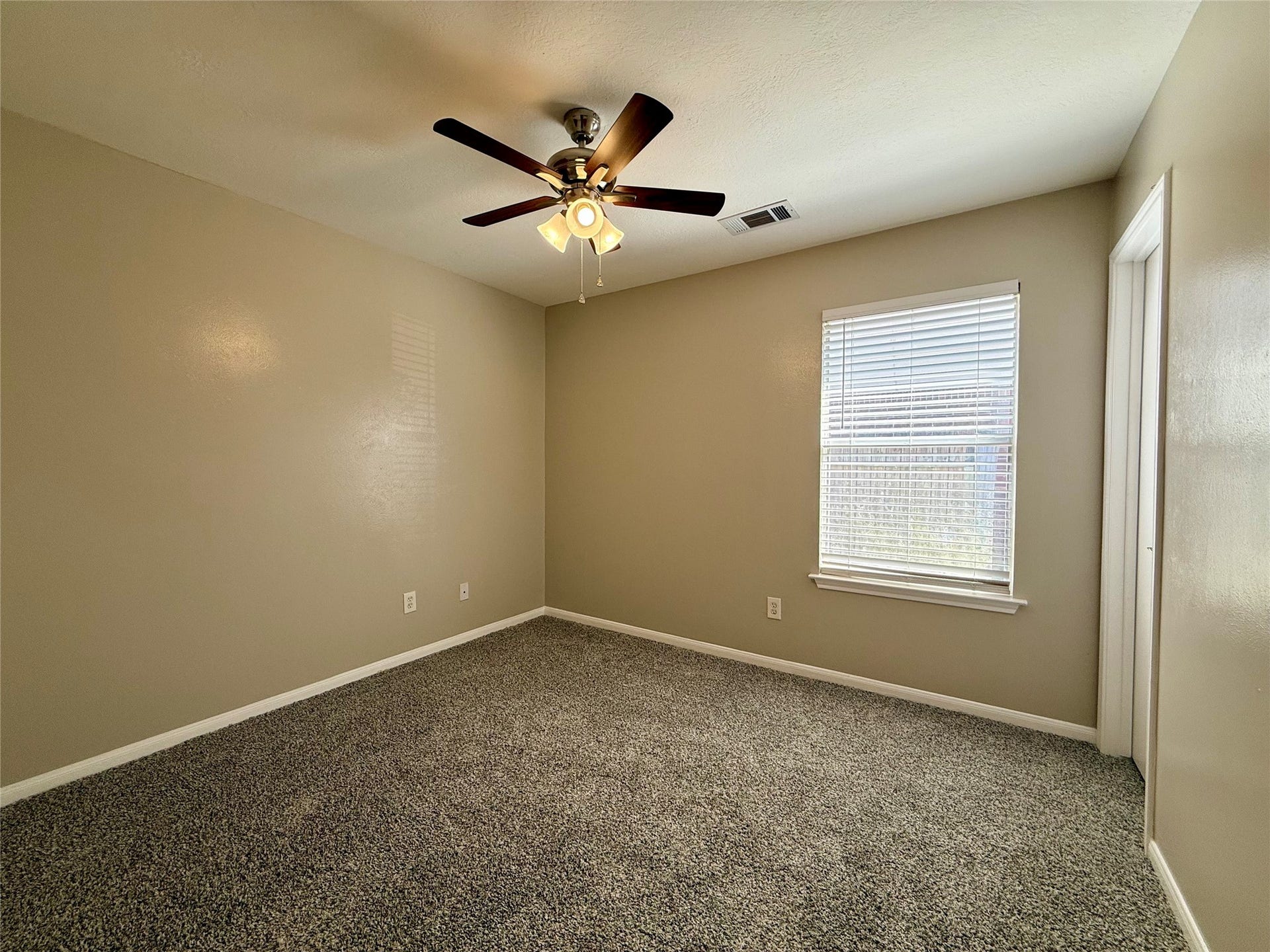 21514 Broadstone Drive, Katy, TX 77449 One of the secondary bedrooms with new carpet.