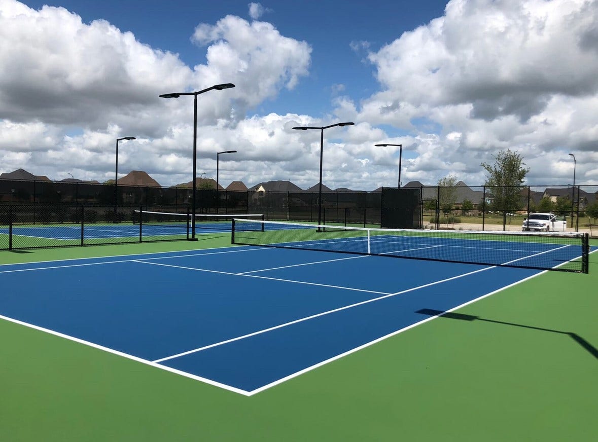 6110 Dovetail Cliff Court, Katy, TX 77493 Stay active with access to community tennis courts and additional recreational amenities.