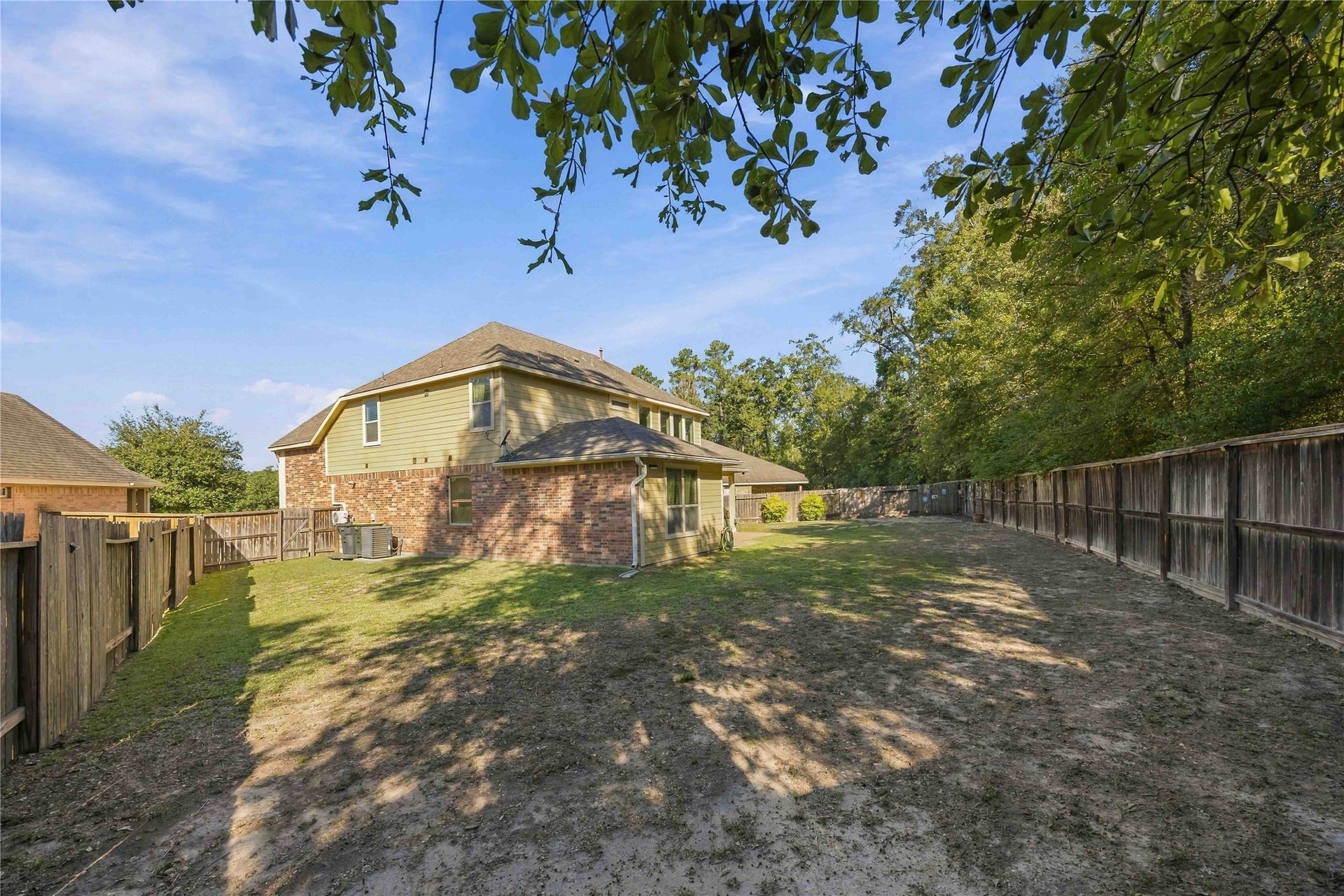 3152 Copeland Bend, Conroe, TX 77301 The fenced backyard backs up to no neighbors, giving you privacy you can really enjoy.