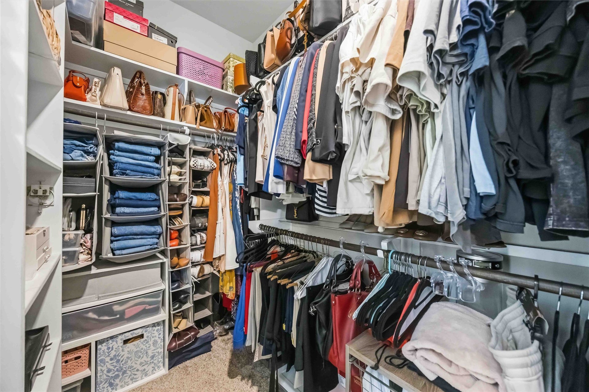 3152 Copeland Bend, Conroe, TX 77301 The walk-in closet offers built-in shelving and generous hanging space for every season.