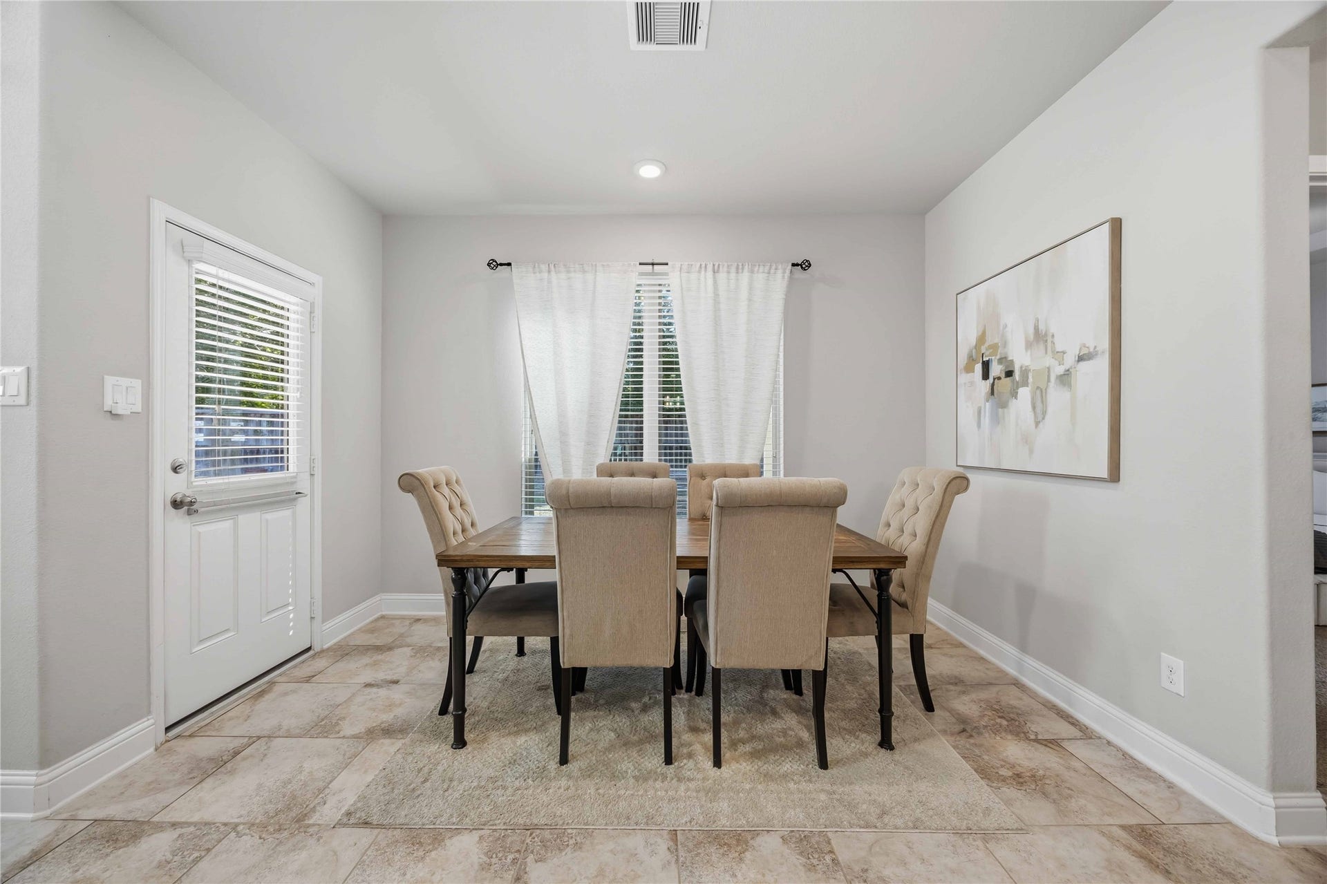 3152 Copeland Bend, Conroe, TX 77301 Natural light fills the dining room, ready for everything from Sunday brunch to holiday dinners.