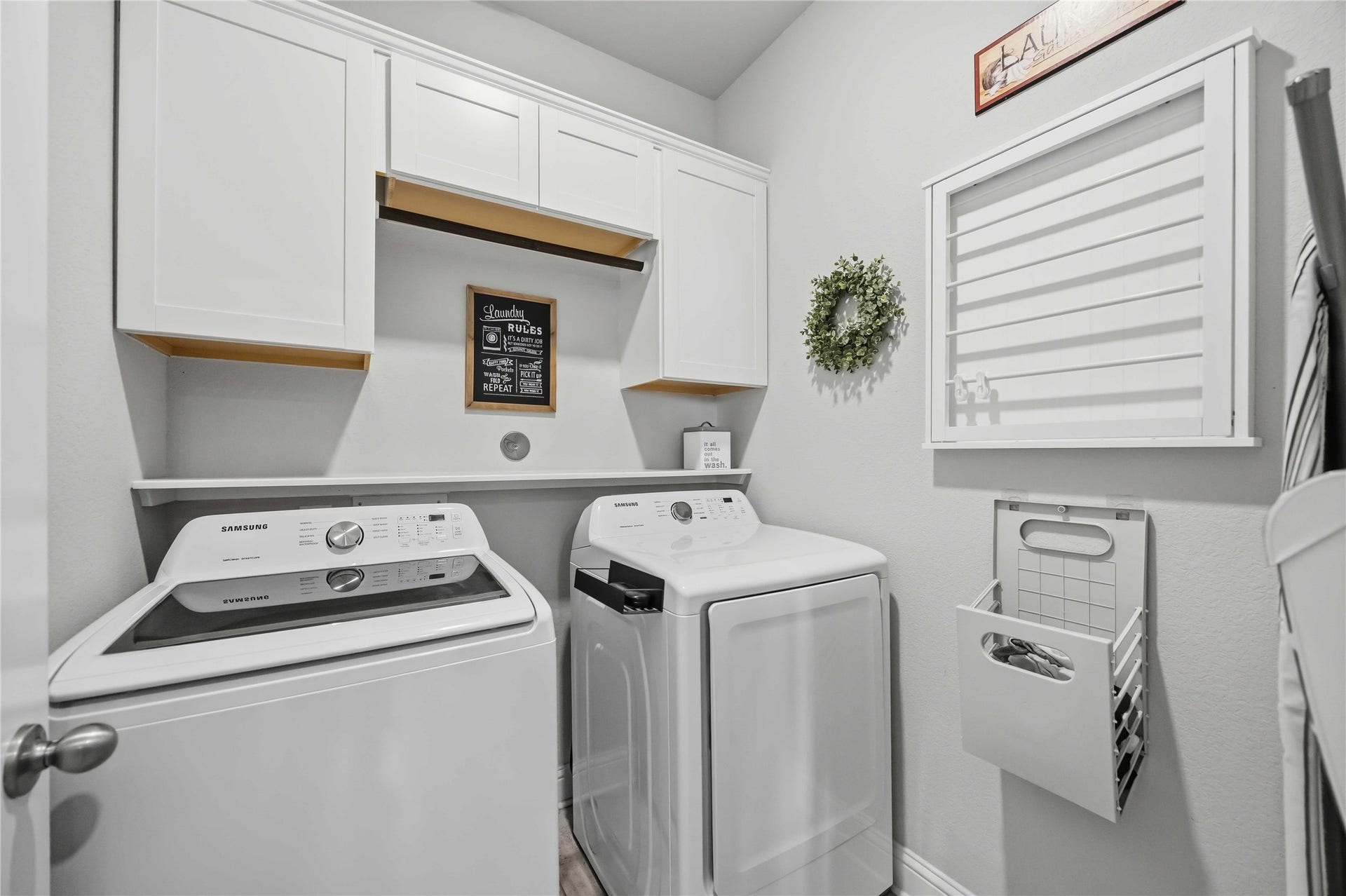 3152 Copeland Bend, Conroe, TX 77301 Built-in cabinetry keeps the utility room organized and laundry day simple.