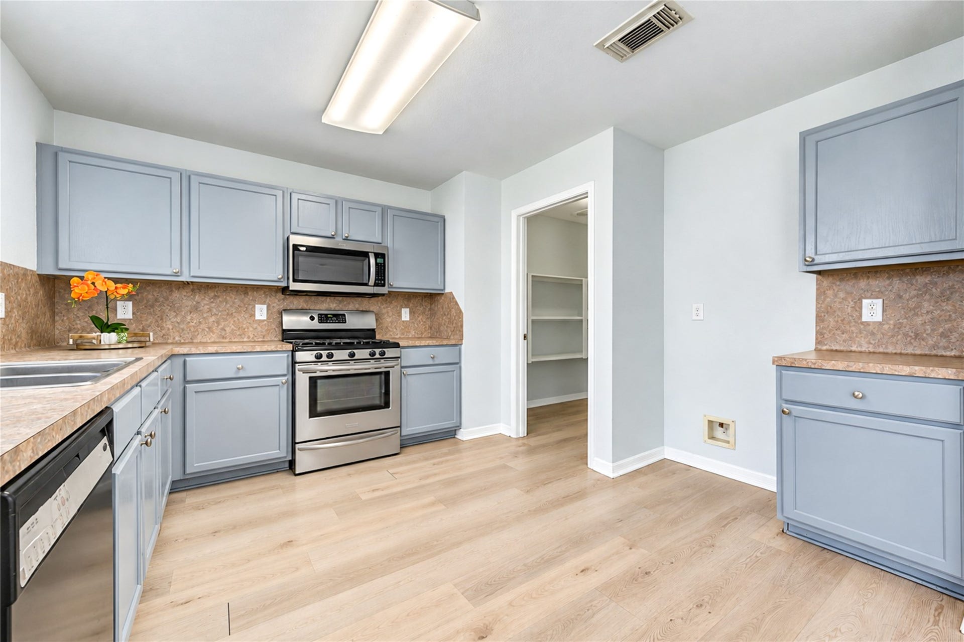20910 Trenton Valley Lane, Katy, TX 77449 Bright and inviting kitchen featuring stainless steel appliances, ample cabinetry, generous counter space, and a clean modern feel.
