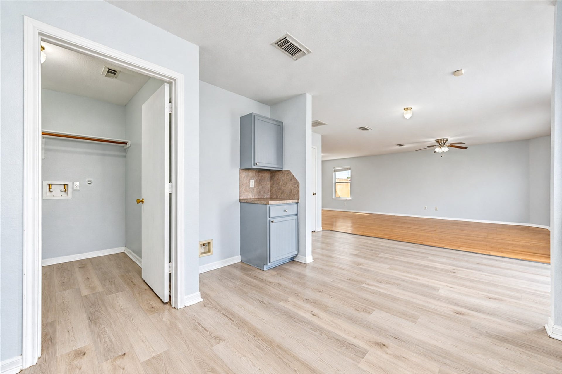 20910 Trenton Valley Lane, Katy, TX 77449 Convenient utility area just off the kitchen with washer and dryer connections, additional storage, and easy access to the open living space.