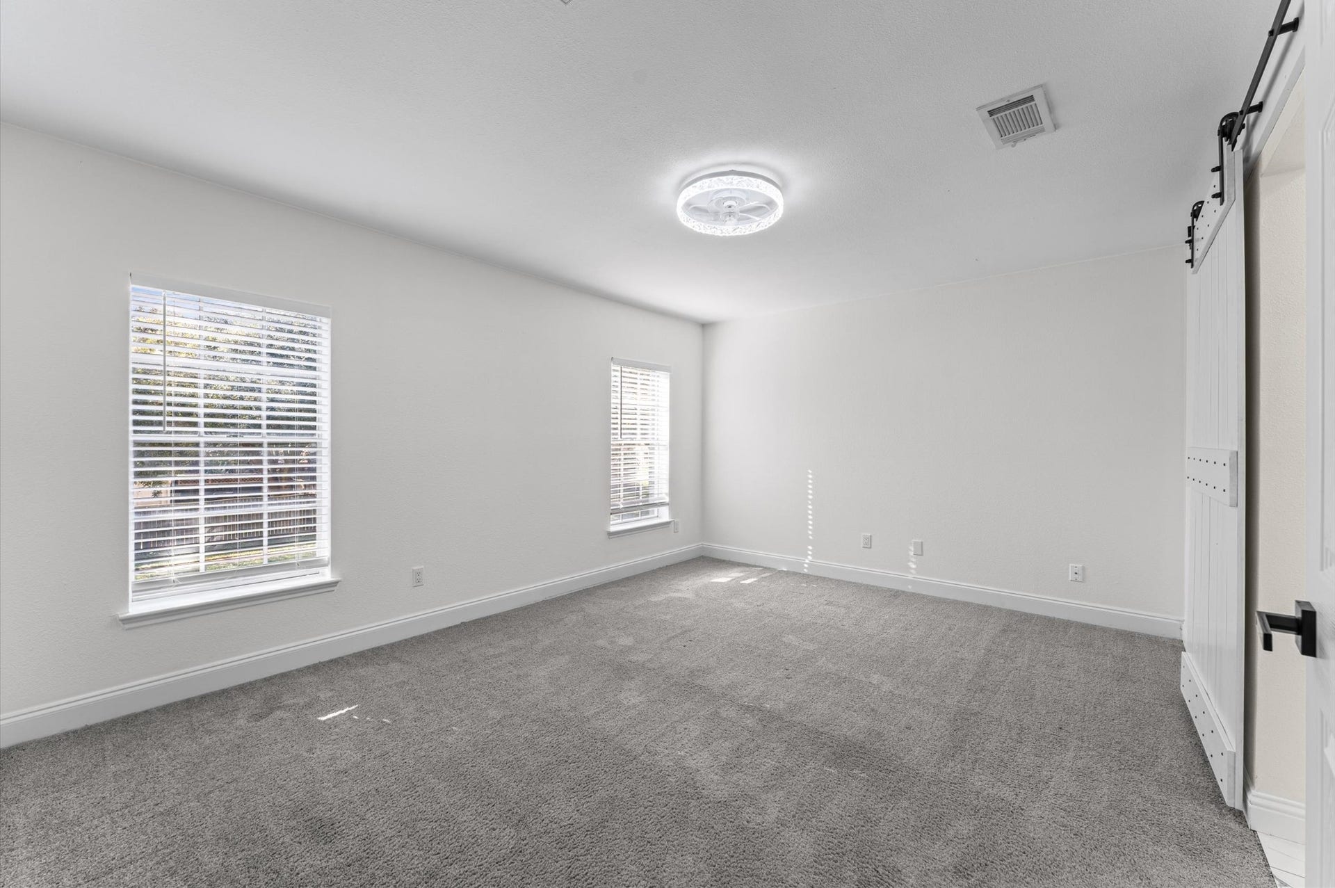 1118 Cheyenne Meadows Drive, Katy, TX 77450 The Primary Bedroom is located on the second floor and features two windows that bring in natural light.