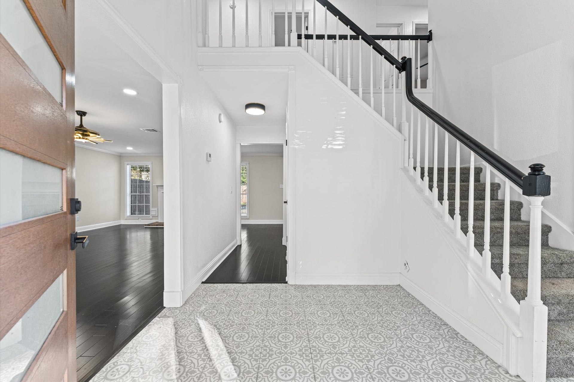 1118 Cheyenne Meadows Drive, Katy, TX 77450 The two-story entry opens to the Living Room on your left and the formal Dining Room on your right.
