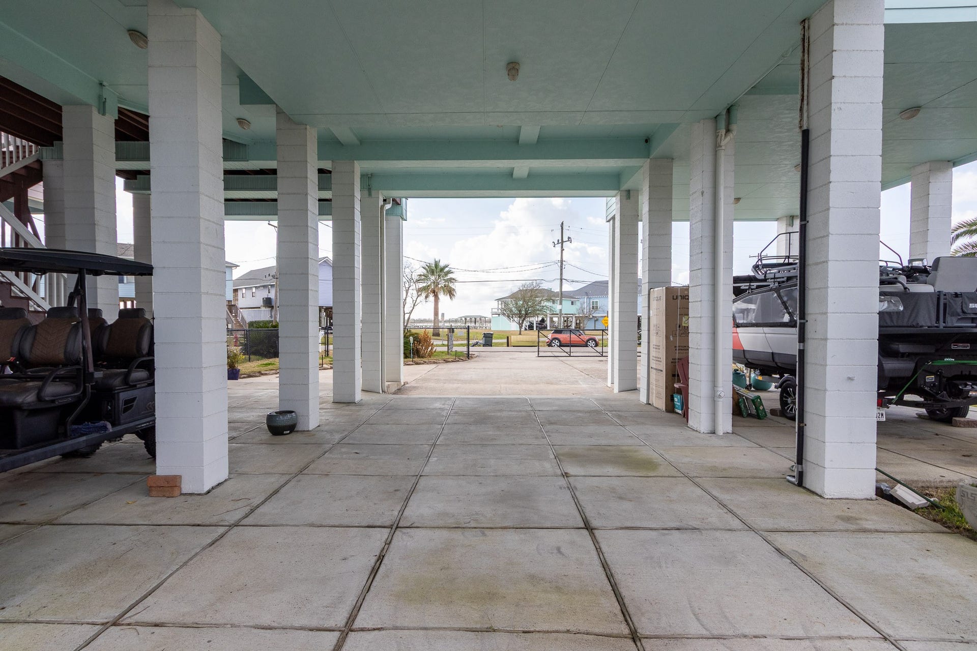 2414 Avenue P, San Leon, TX 77539 Tall concrete pillars-- ready for your boat, golf cart. Plenty of parking and additional entertaining space.