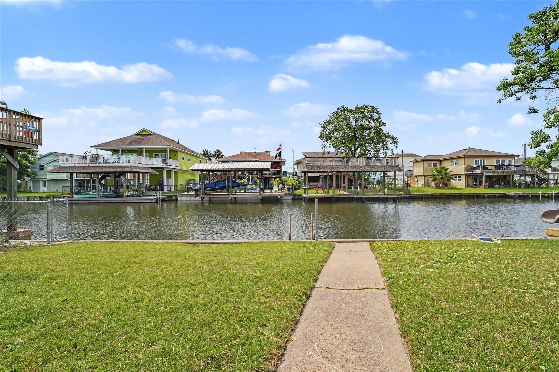 370 Ling Street, Bayou Vista, TX 77563 Sidewalk to the water. The home's price allows you to add some exterior updates and still fall in budget