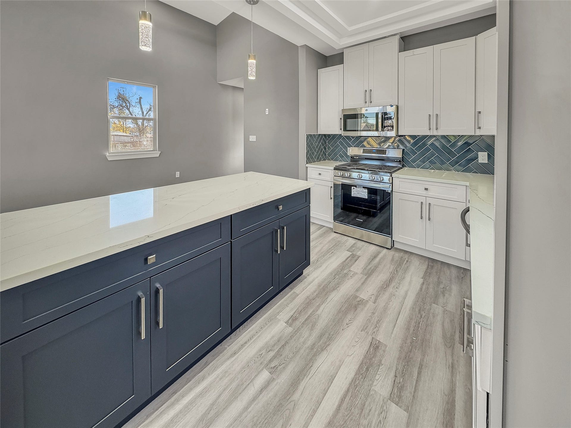 4819 Los Angeles Street, Houston, TX 77026 Modern kitchen with sleek cabinetry and ample counter space