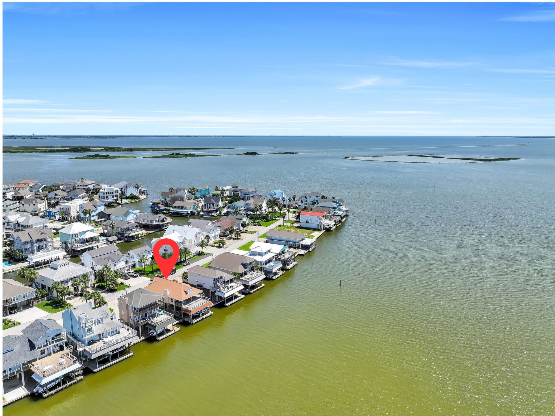 243 Isles End Road, #RR2, Tiki Island, TX 77554 From above, the appeal of Tiki Island becomes unmistakable. Nestled along the bayfront, this home offers the best of island living with deep-water access, incredible fishing opportunities, and quick boating routes into West Bay, Galveston Bay, and beyond. Every day feels like a vacation here.