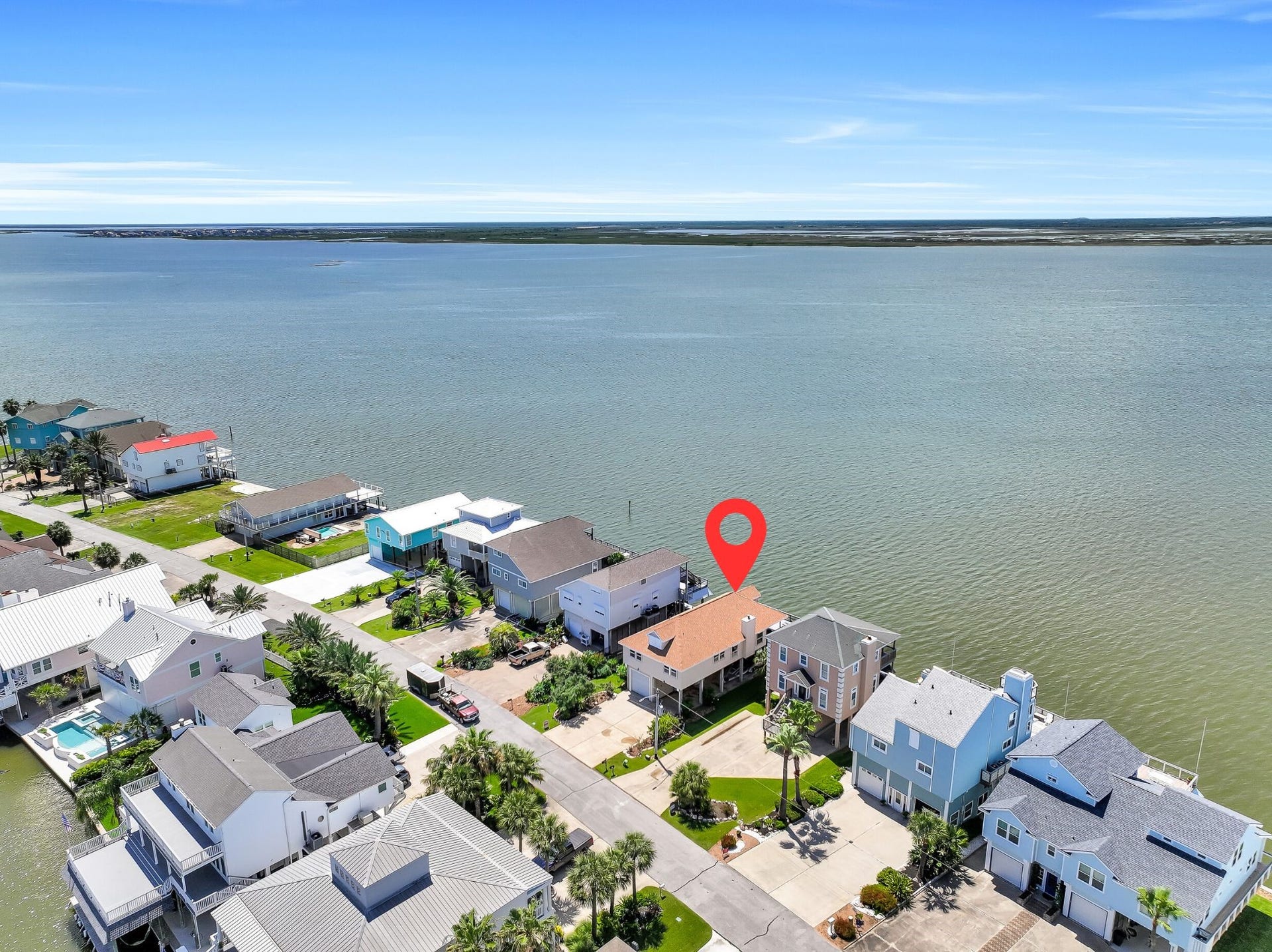 243 Isles End Road, #RR2, Tiki Island, TX 77554 Unlike many waterfront properties, this location offers expansive open-water frontage with unobstructed views stretching for miles across Jones Bay. The wide bay exposure creates a feeling of privacy, space, and connection to the water that's increasingly difficult to find along the Texas coast.