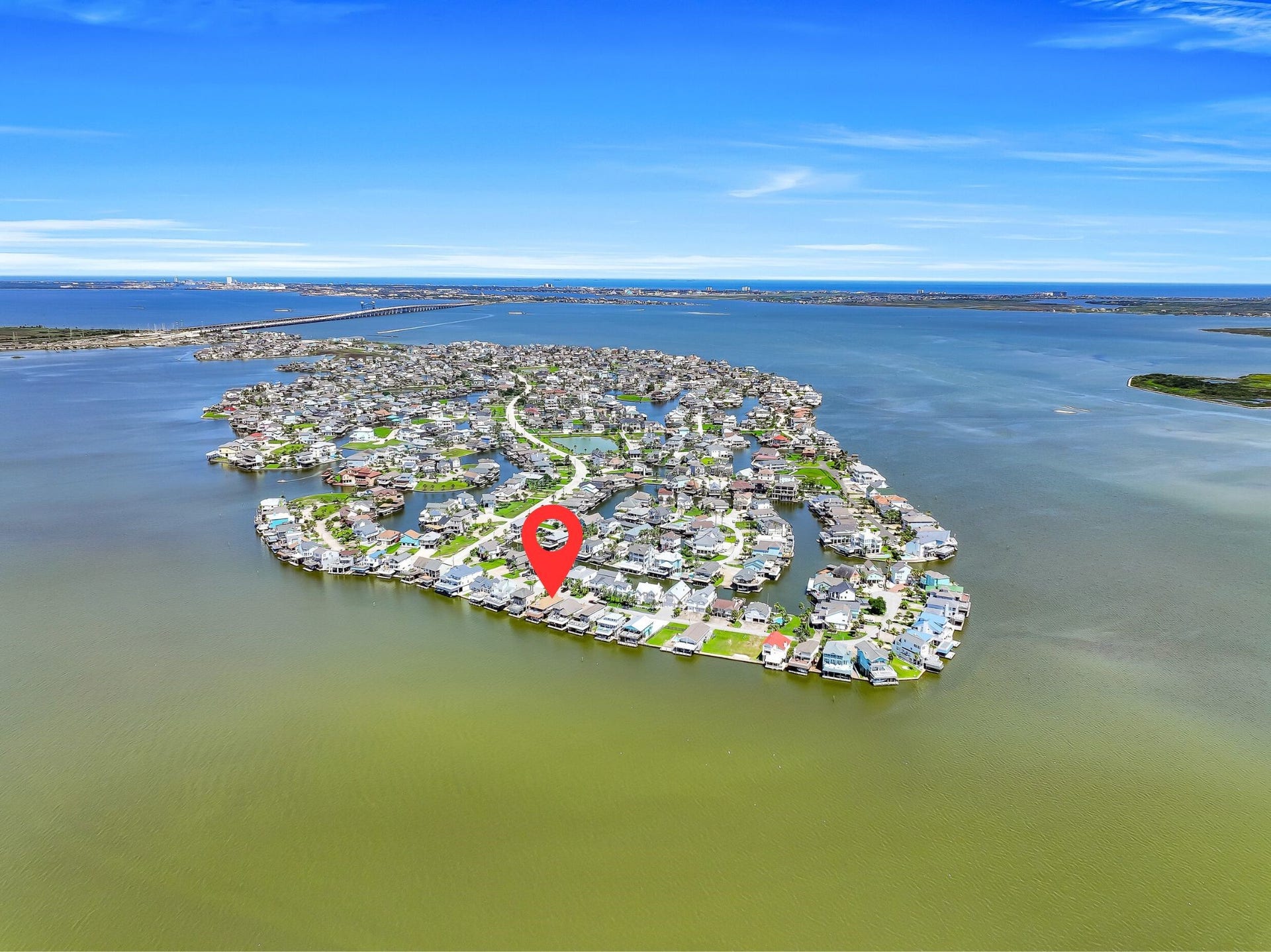243 Isles End Road, #RR2, Tiki Island, TX 77554 A bird's-eye view reveals the unique beauty of Tiki Island, where canals, bayfront homes, boating, fishing, and waterfront sunsets define daily life. Whether you're searching for a weekend retreat or a full-time coastal residence, this is an opportunity to enjoy some of the most spectacular waterfront living on the Texas coast.