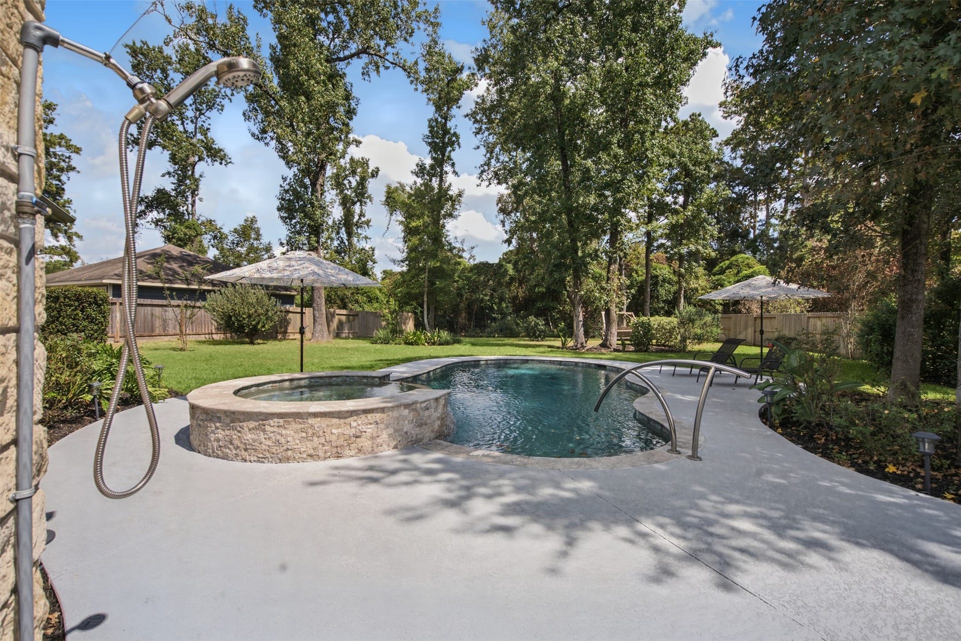 Cooling off is easy in this pool with cool deck coating surround cooler on the feet