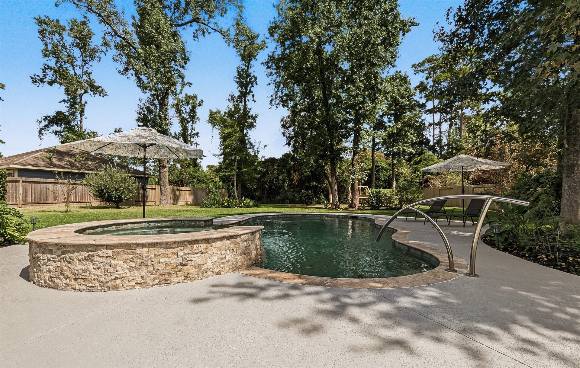 Expansive backyard perfect for games, gatherings, and pets to enjoy.