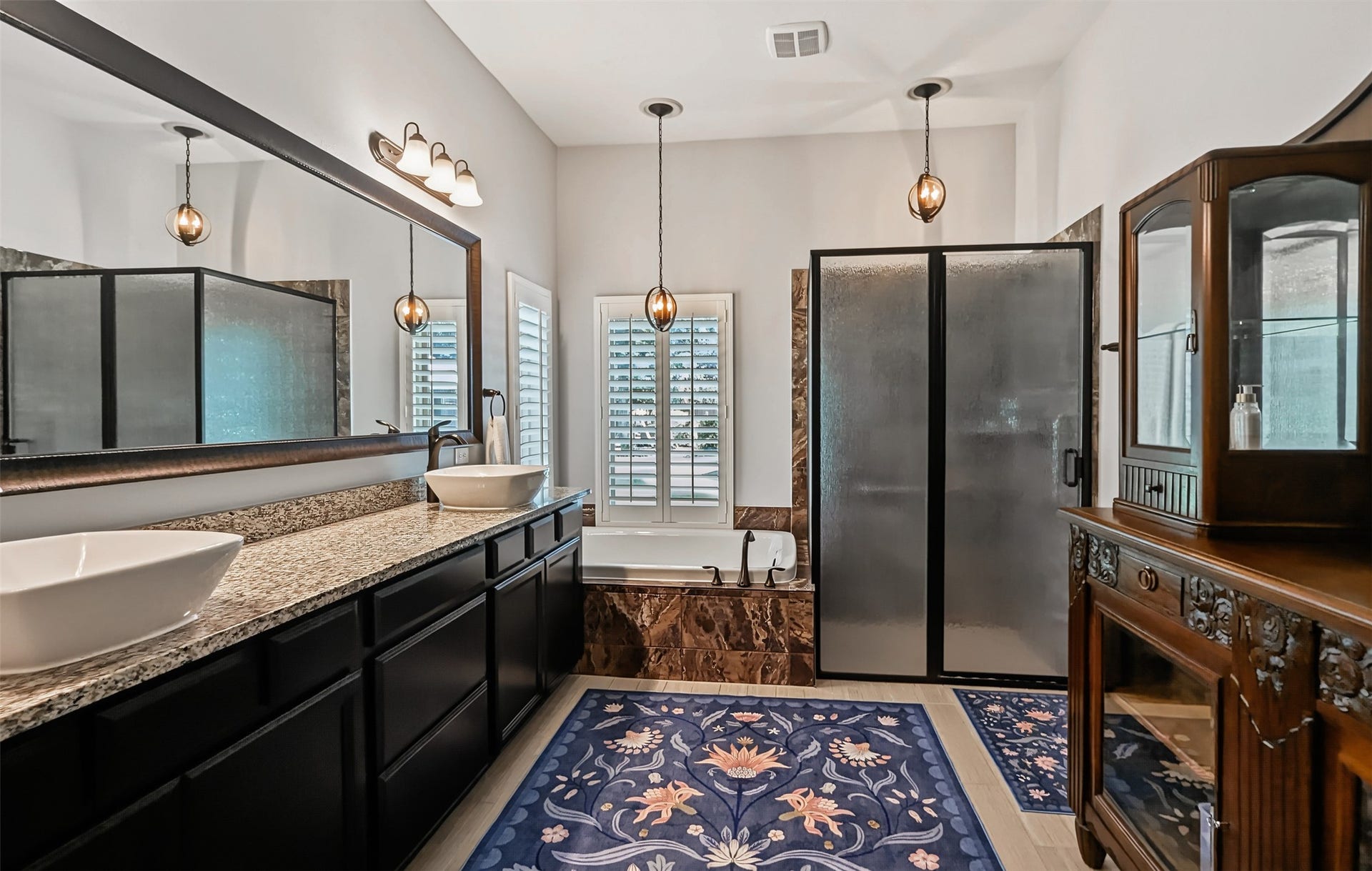 Dual sinks with large vanity area makes sharing space easy
