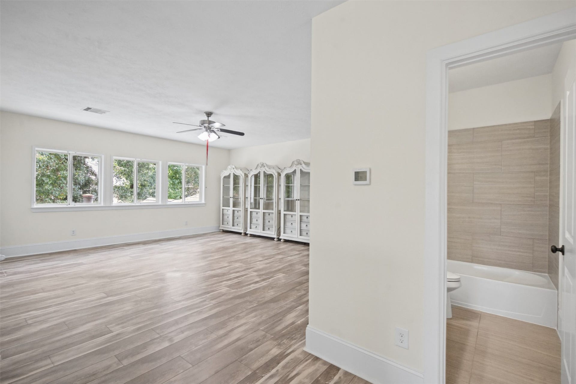 Super large game room, ready for pool, ping pong, perhaps even another bedroom with its own bull bath .  Numerous uses for this room