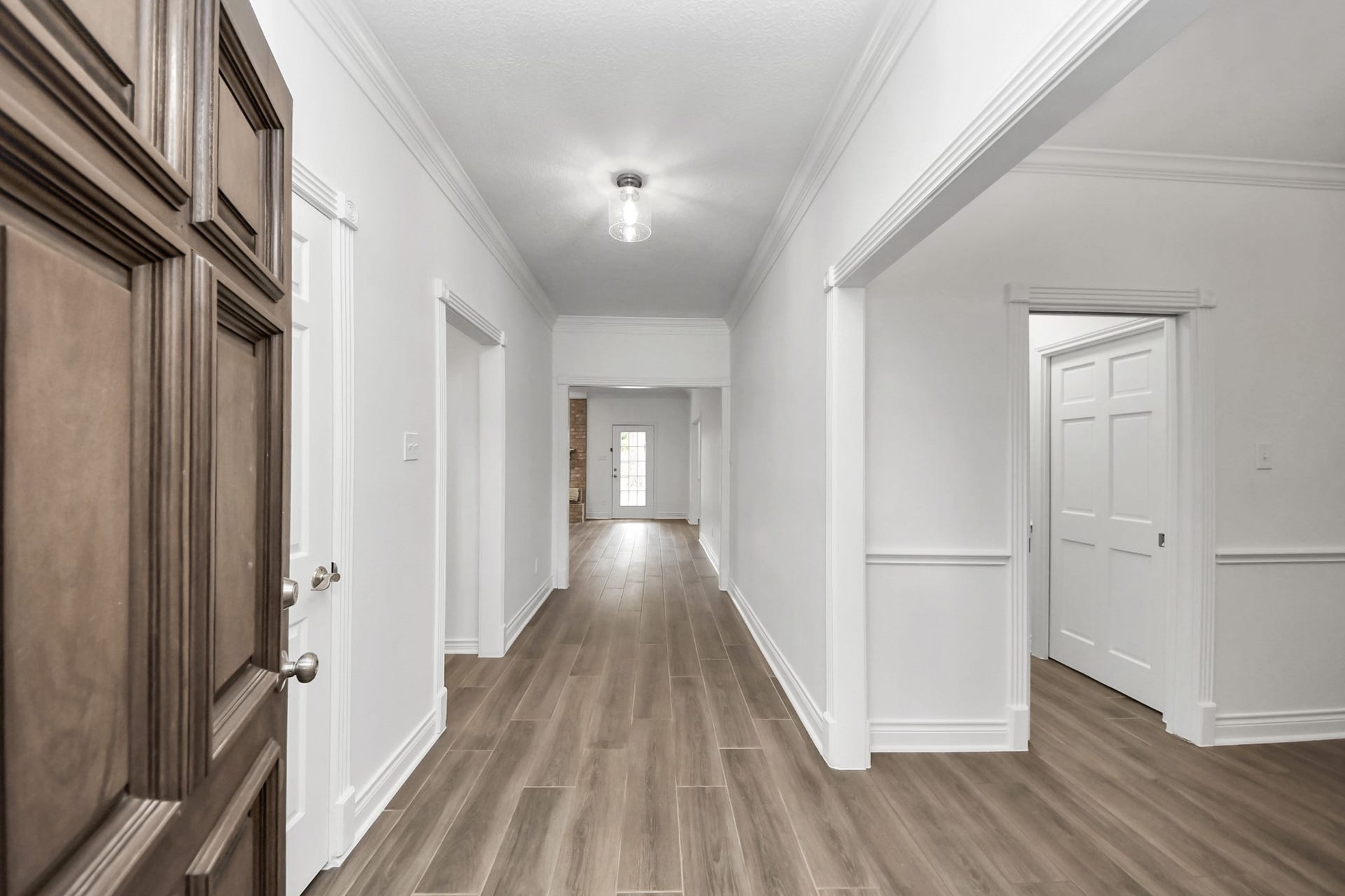 Elegant entryway with a modern look and fresh painted walls.