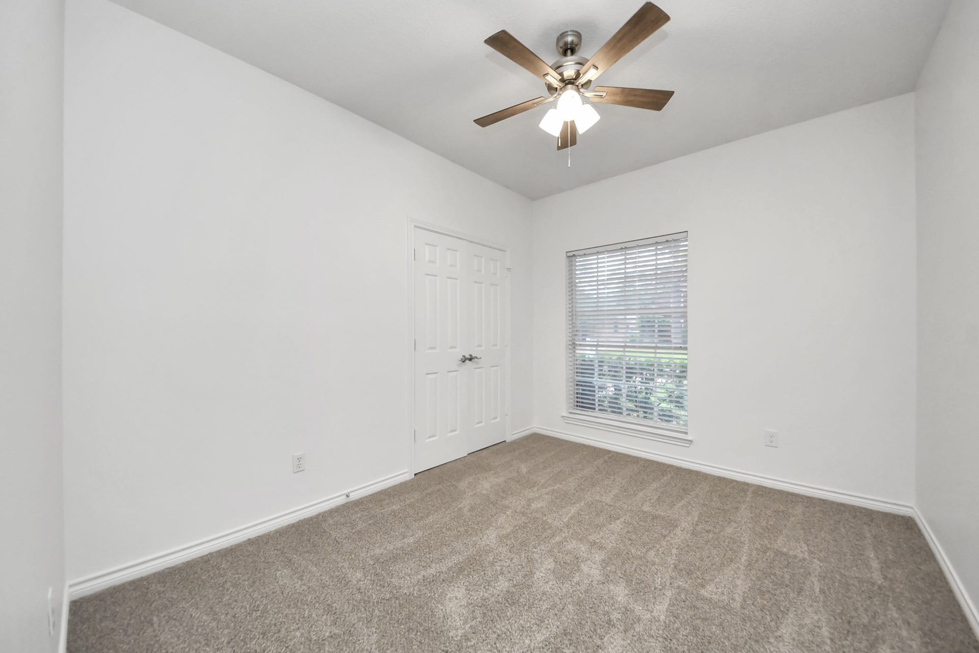 New carpeting, fresh paint. Perfect bedroom offers a welcoming and relaxing space for family members or overnight visitors.
