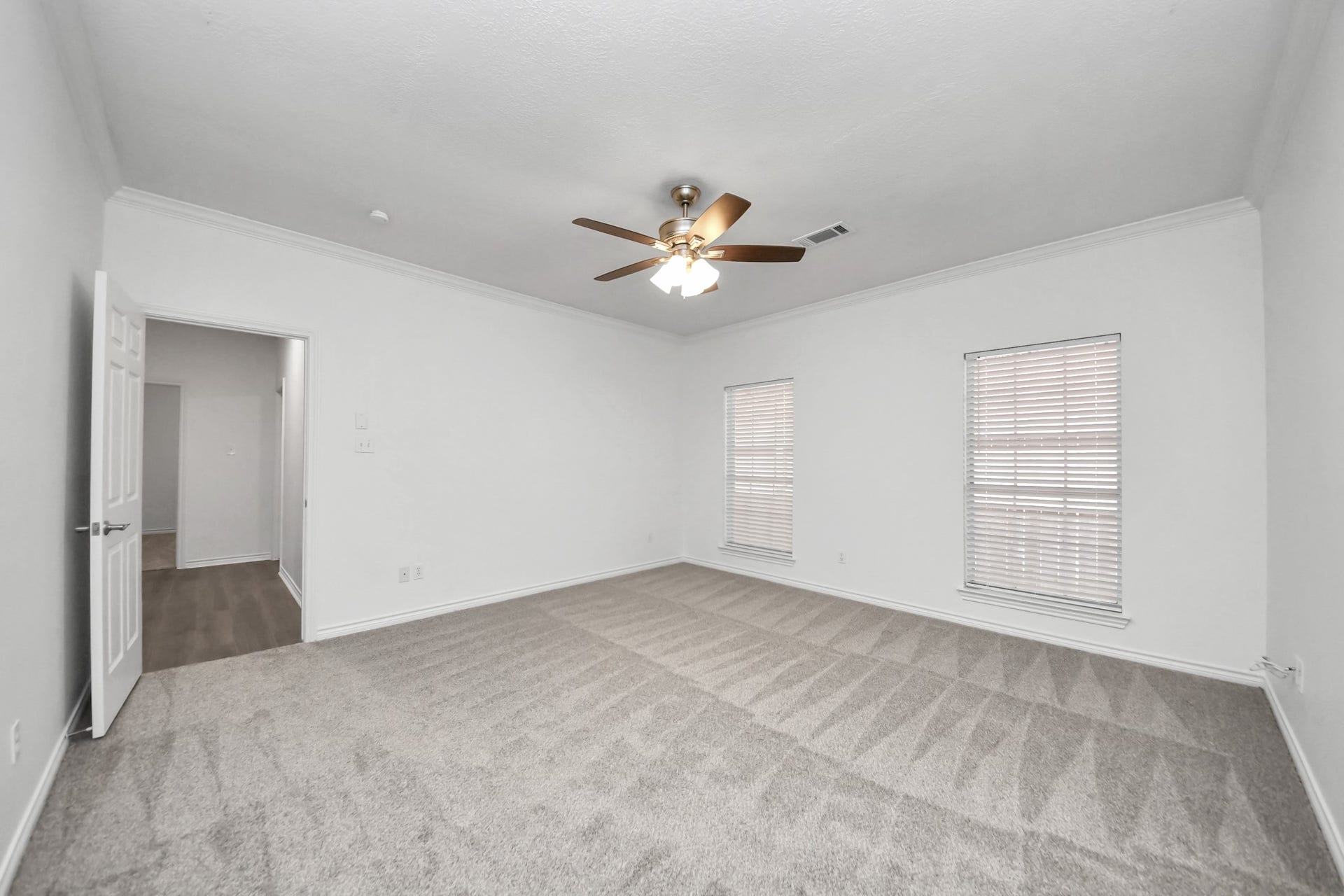 Large primary bedroom perfect for a serene retreat.