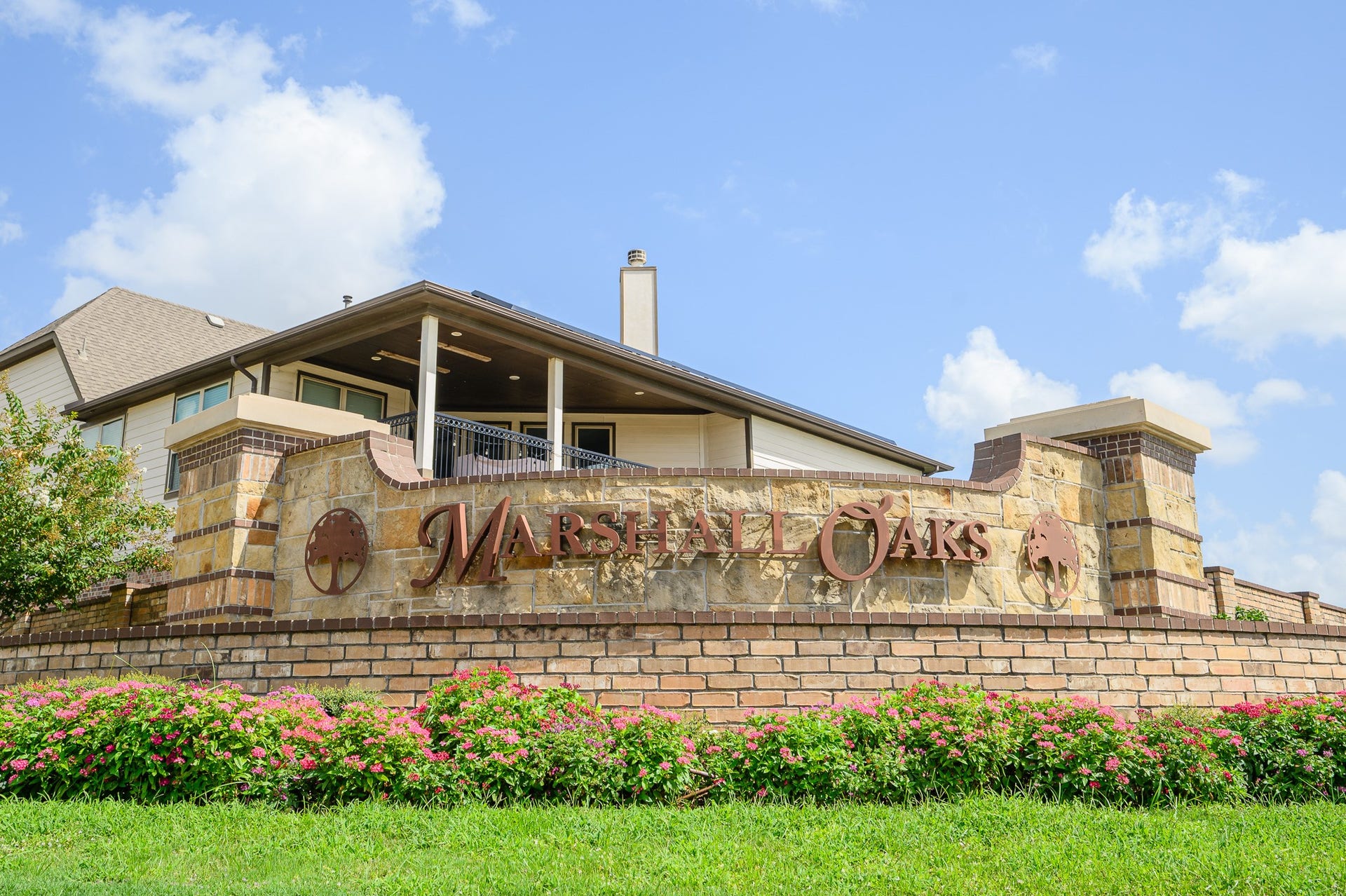 25610 Buckley Bluff Lane, Katy, TX 77494 Discover the inviting charm of Marshall Oaks, where elegant stonework and lush landscaping create a serene and welcoming community ambiance.