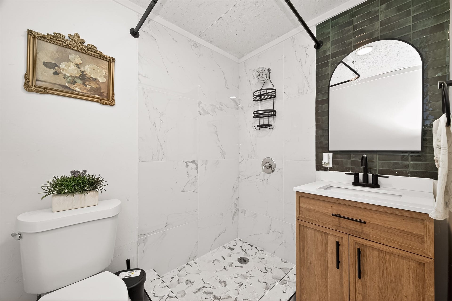 Elegant and spacious full bathroom.