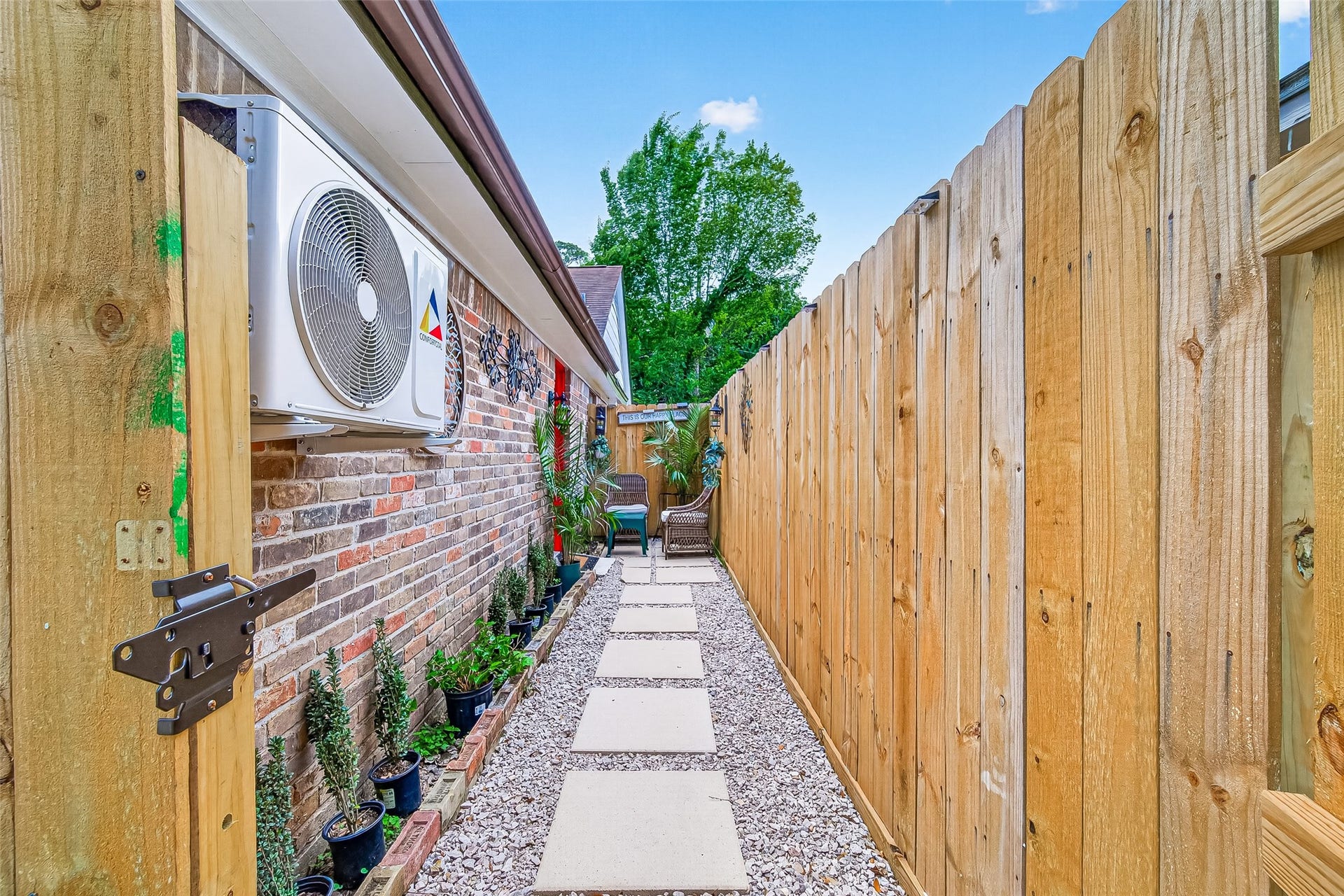 Charming walkway leading to the entrance of the garage apartment.