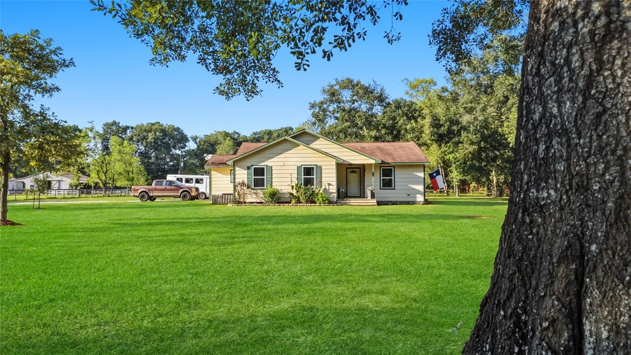 Property photo for 26925 E River Road, Splendora, TX