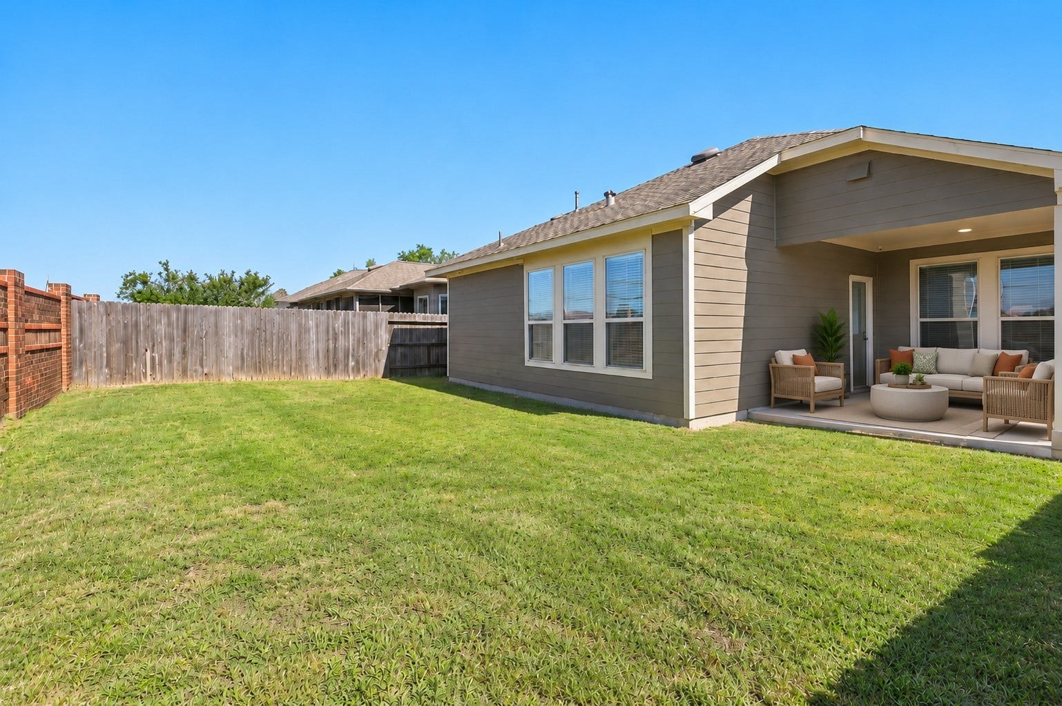 7814 Tindarey Maple Trace, Richmond, TX 77407 Generously sized fenced backyard offering plenty of room for outdoor recreation and future customization.